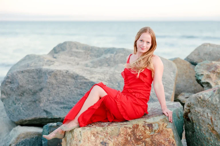 Girl in Red Posing on a Rock on Coronado