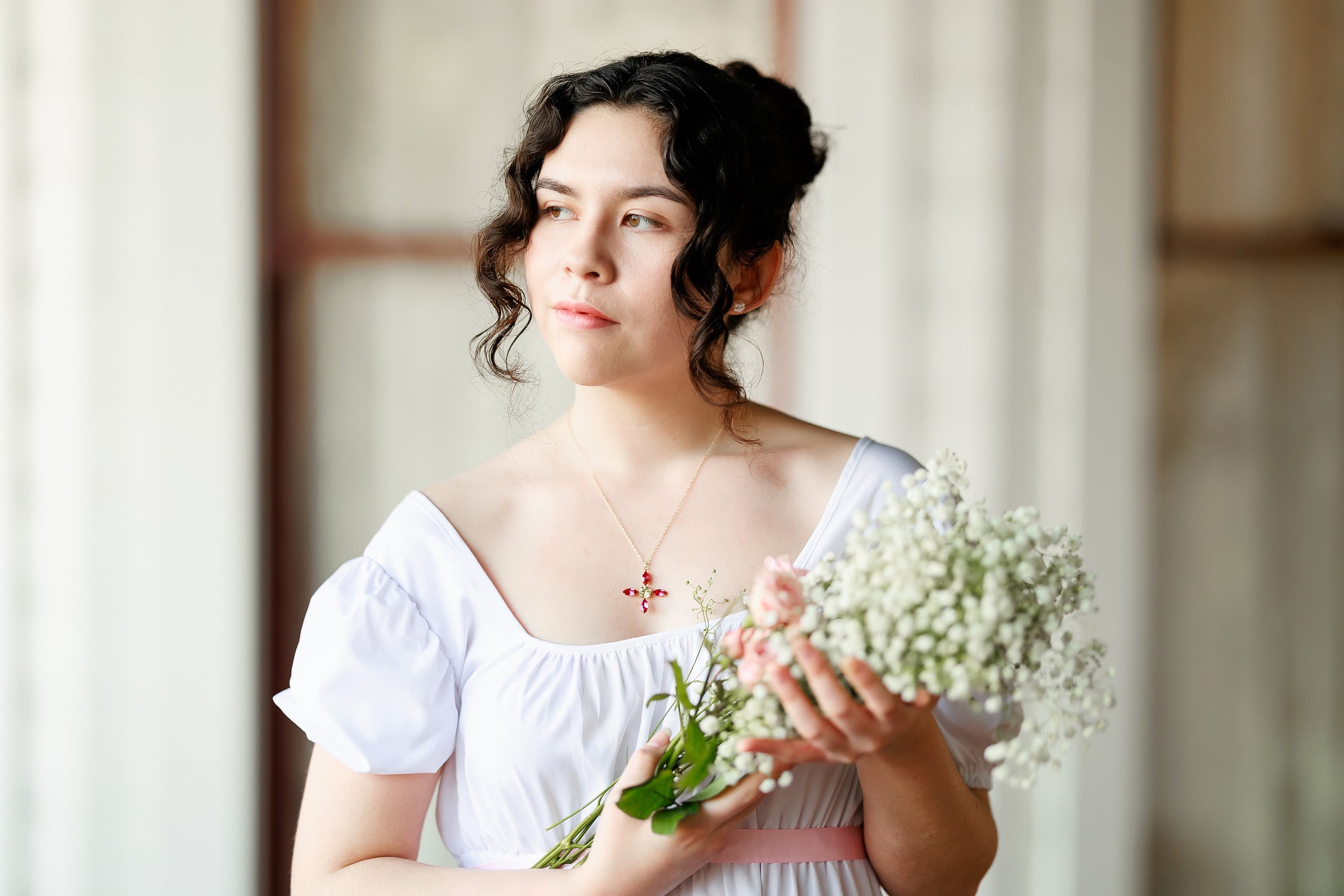 Amanda Fagan’s Love, Jane — 06 Woman in white dress holding white baby's breath bouquet, looking at camera