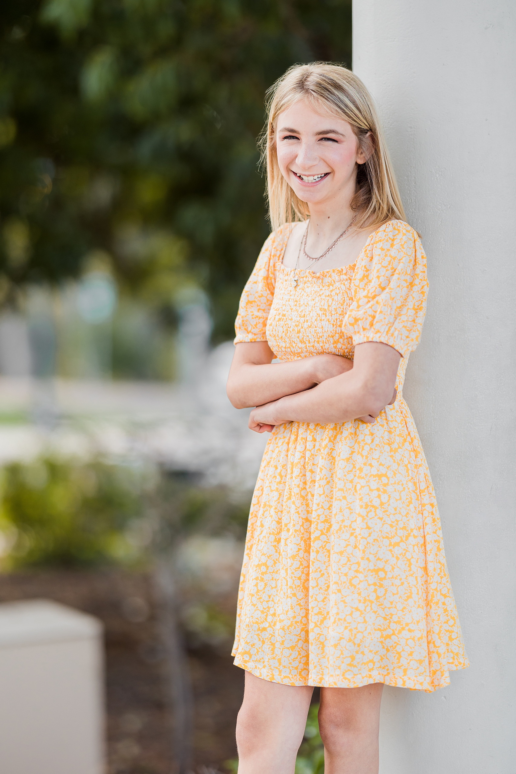 Balboa Park Family Portraits San Diego — 05 Teen girl in yellow dress standing with arms crossed at Balboa Park