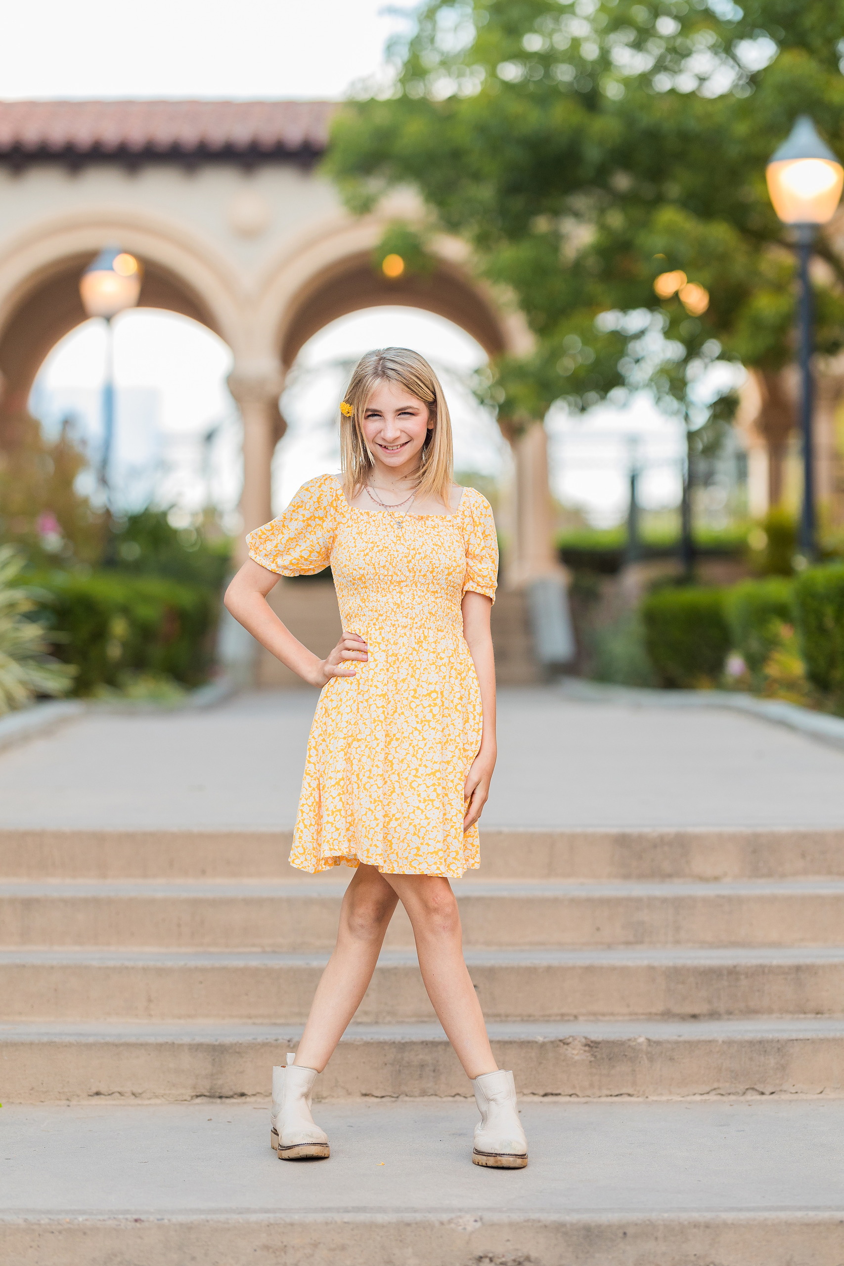 Balboa Park Family Portraits San Diego — 12 Teen girl holding pink rose and looking downward at Balboa Park