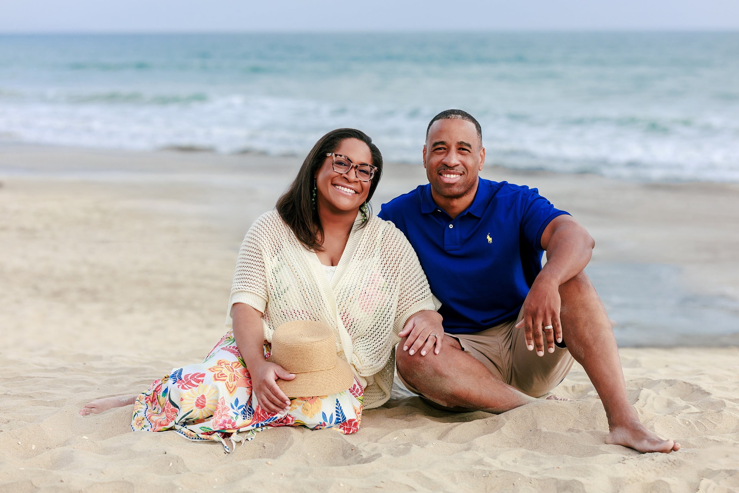 Because Time Flies: Family Photos on Coronado — 08 Michelle and Dion sit together on the sand at Coronado beach