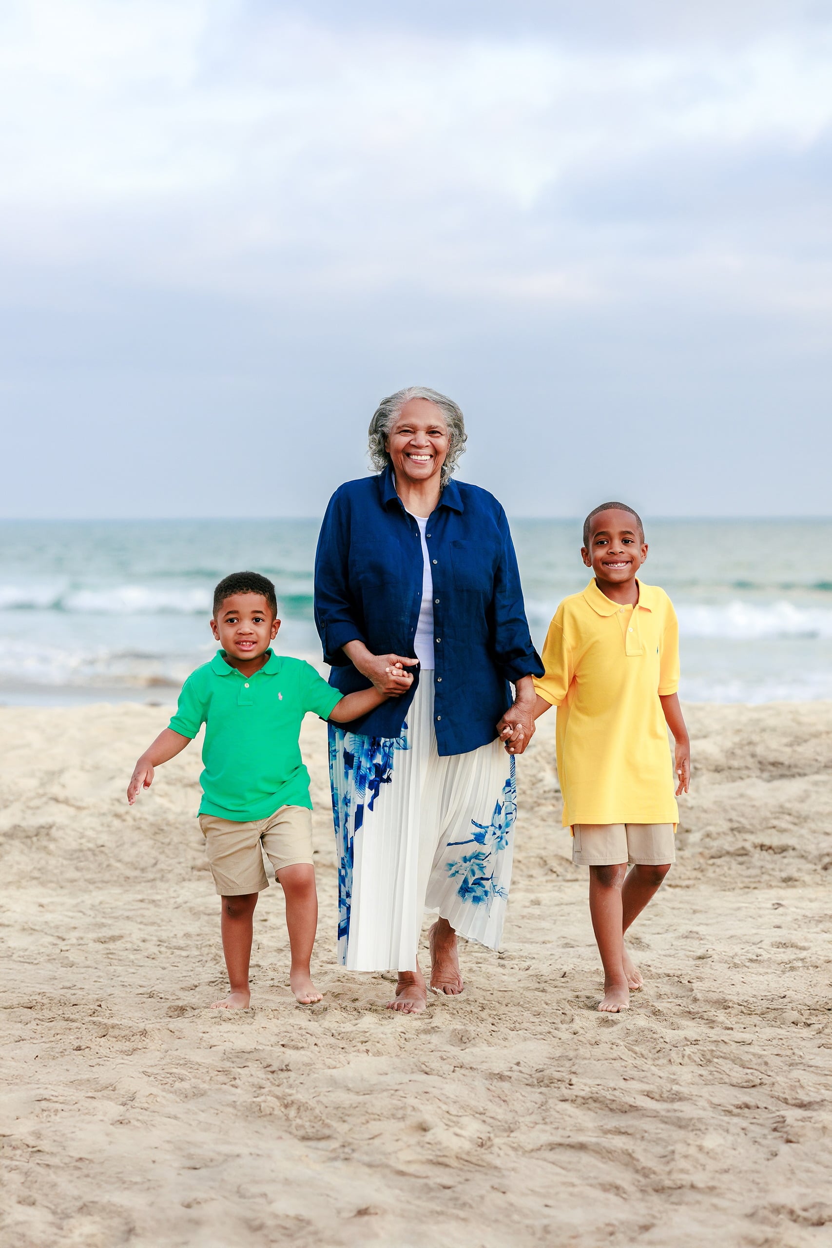 Because Time Flies: Family Photos on Coronado — 12 Bettie walks on the beach holding hands with both grandsons at Coronado