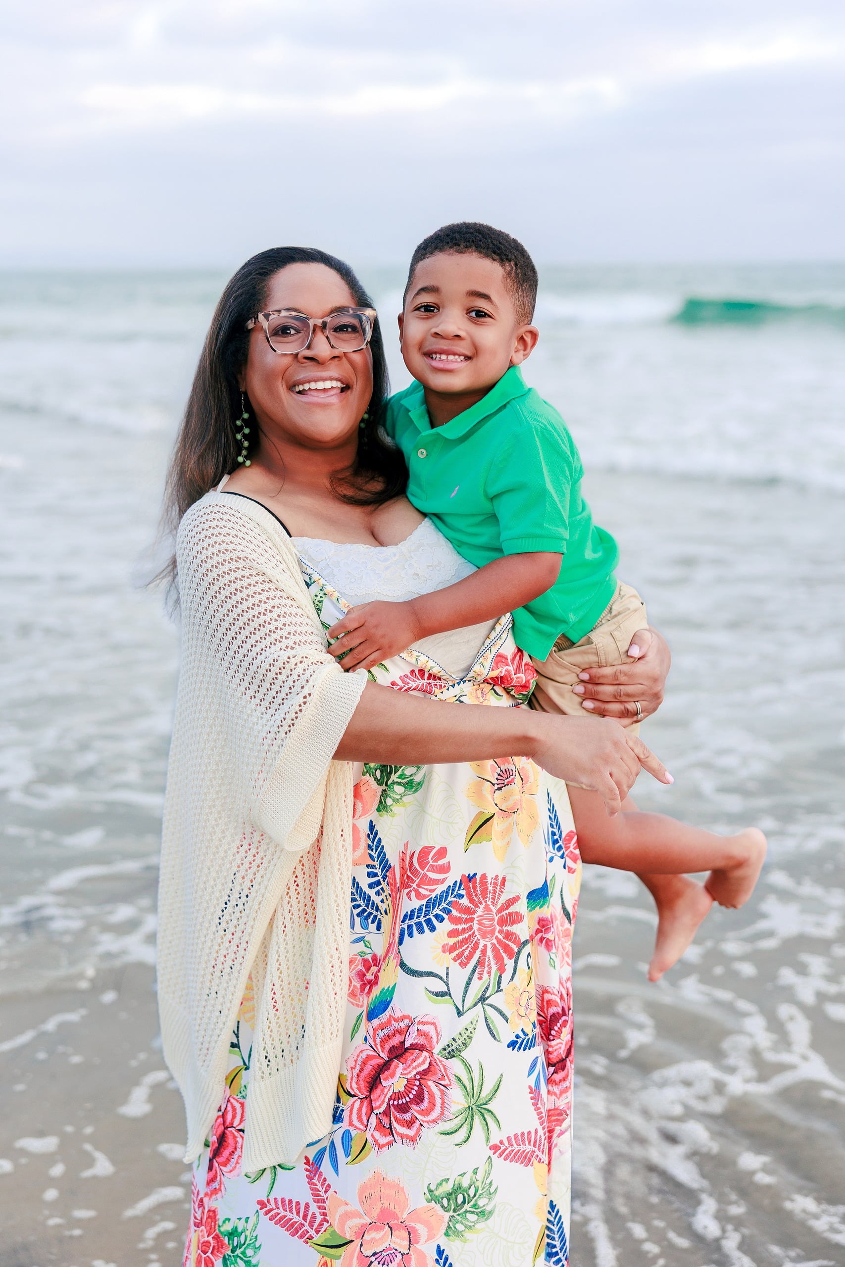 Because Time Flies: Family Photos on Coronado — 16 Michelle holds her younger son in the sand on Coronado beach