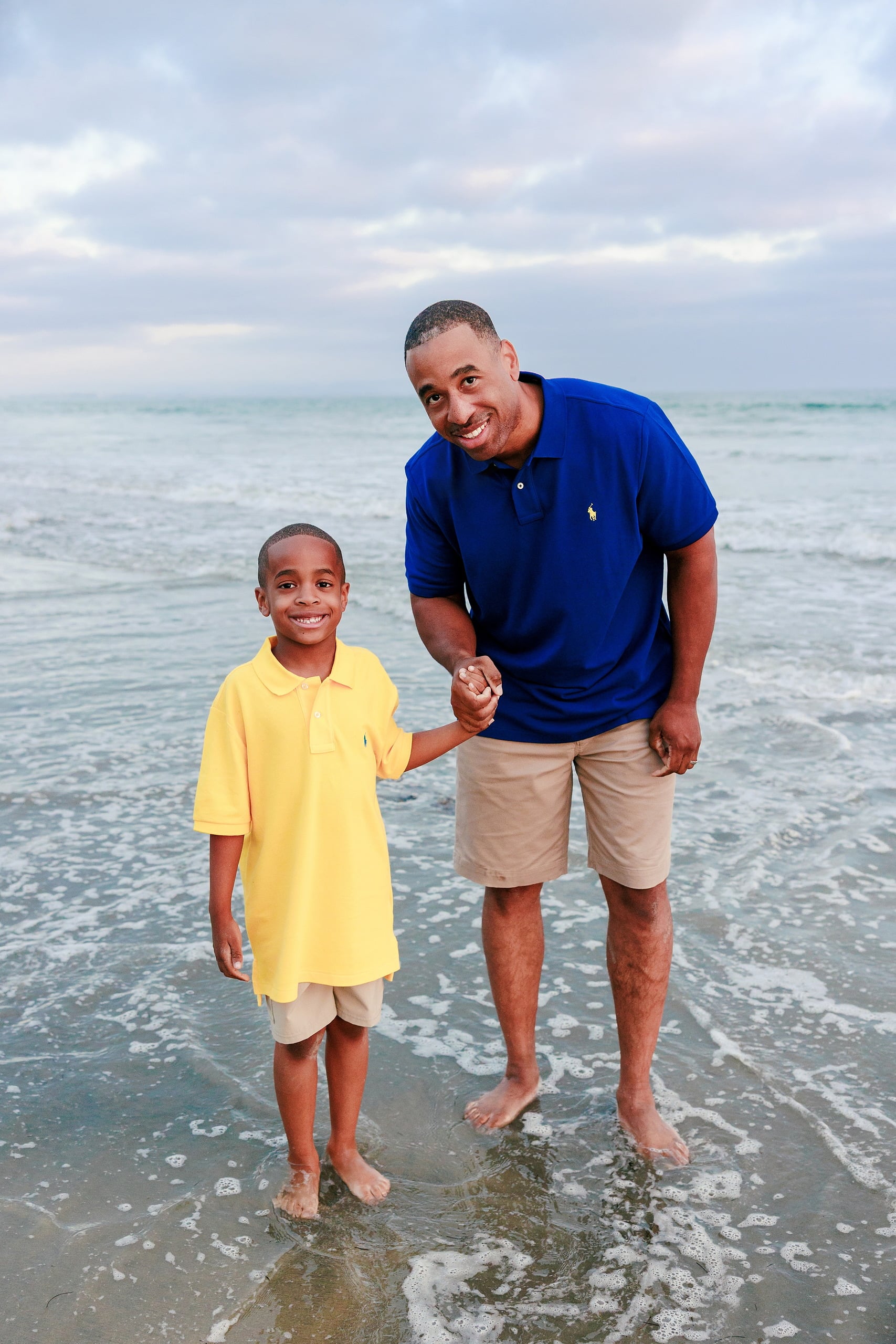 Because Time Flies: Family Photos on Coronado — 18 Dion holds his younger son as they stand in the water at Coronado beach