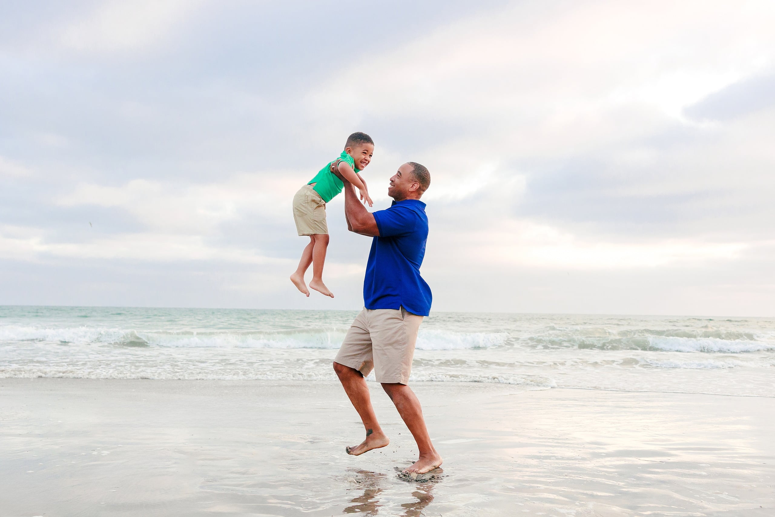 Because Time Flies: Family Photos on Coronado — 19 Dion tosses his younger son in the air while playing in the water