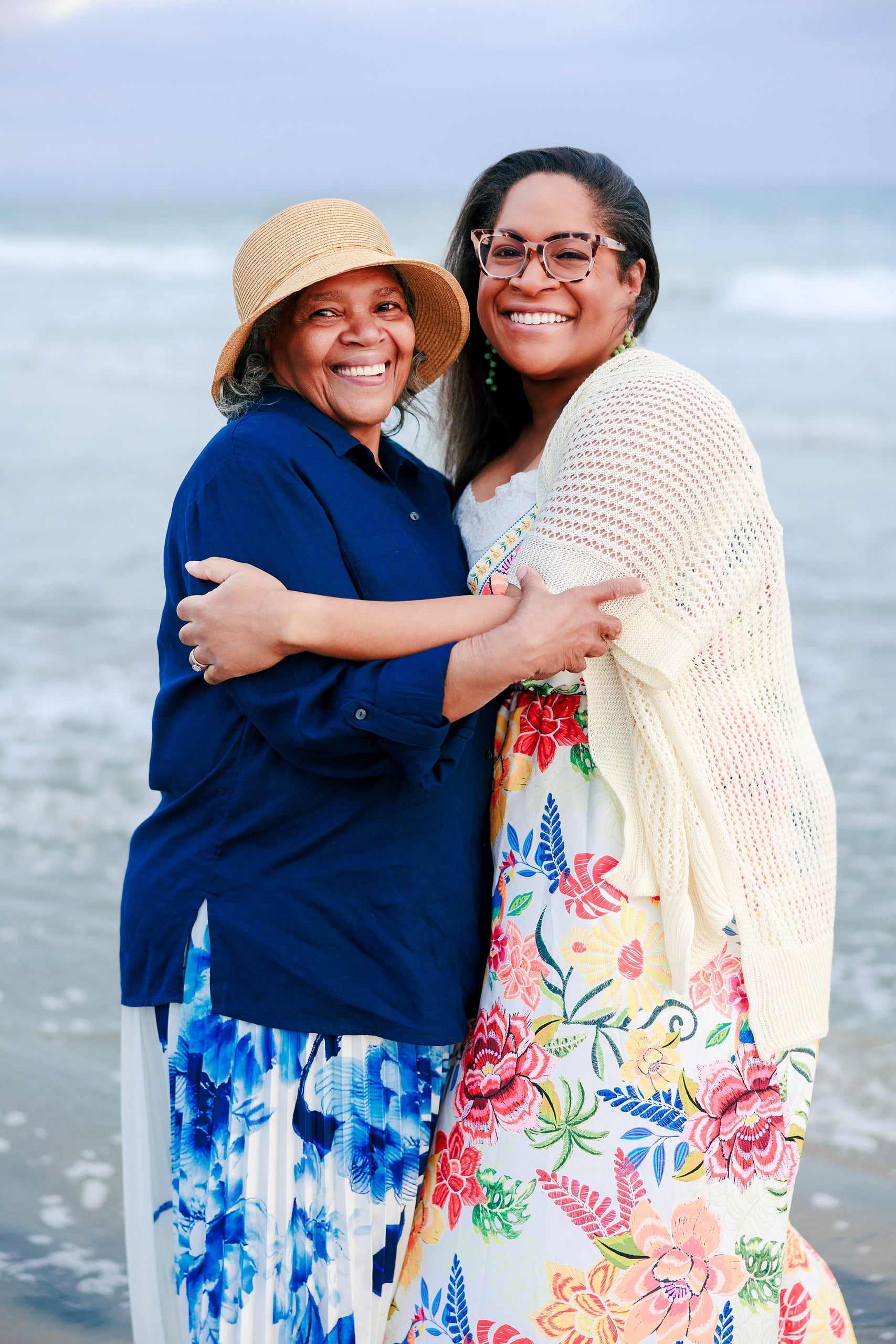 Because Time Flies: Family Photos on Coronado — 20 Bettie and Michelle embrace and smile together on Coronado beach
