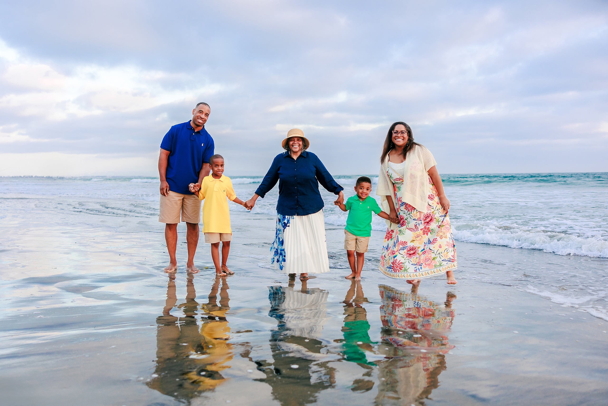 Because Time Flies: Family Photos on Coronado — 26 Extended family wades hand-in-hand in ocean water at Coronado