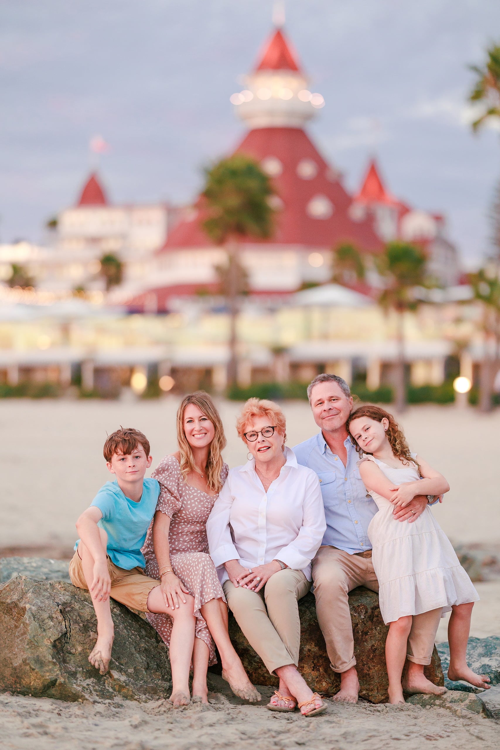Behind the Scenes of Grammy Judy’s 80th Birthday Session: An Interview with Wendy — 29 Close-up side profile of boy in turquoise on beach, looking to the side