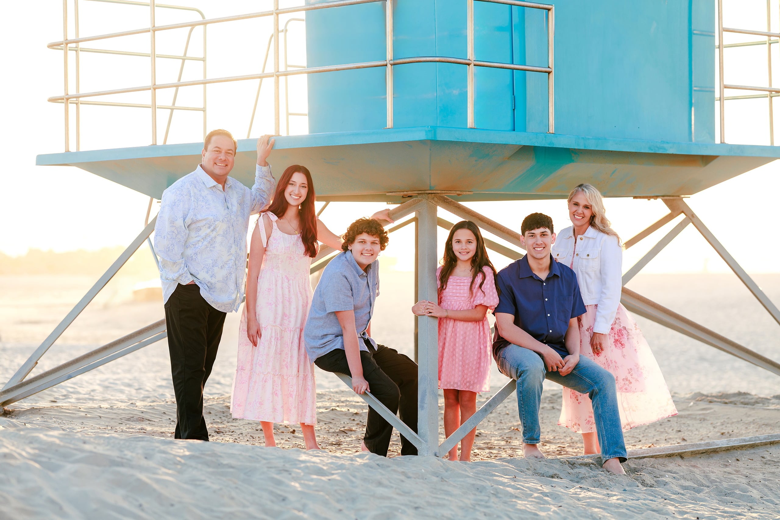 Coronado Beach Memories with the Sanchez Family — 11 Girl in pink dress running barefoot on Coronado Beach at golden hour