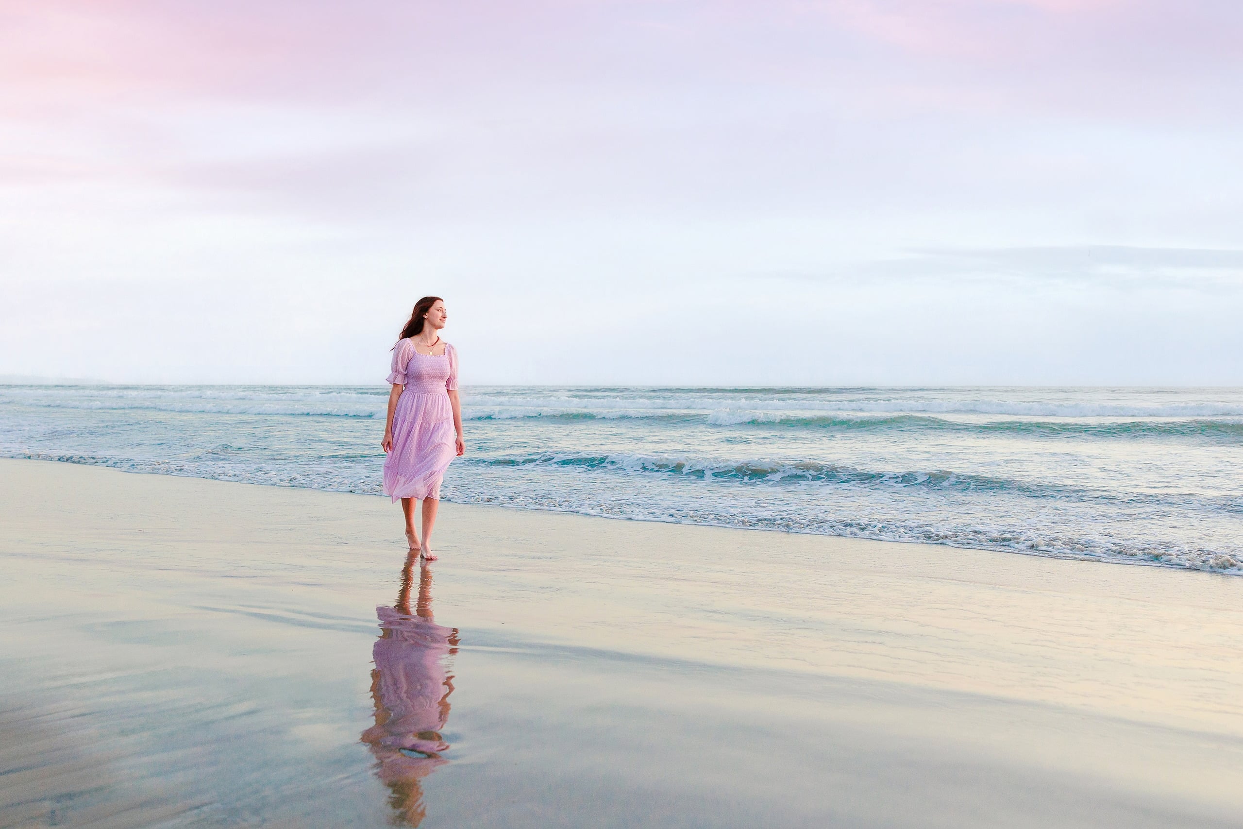 Coronado Beach Memories with the Sanchez Family — 22 Woman and girl in pink dresses wading together in shallow water on Coronado Beach