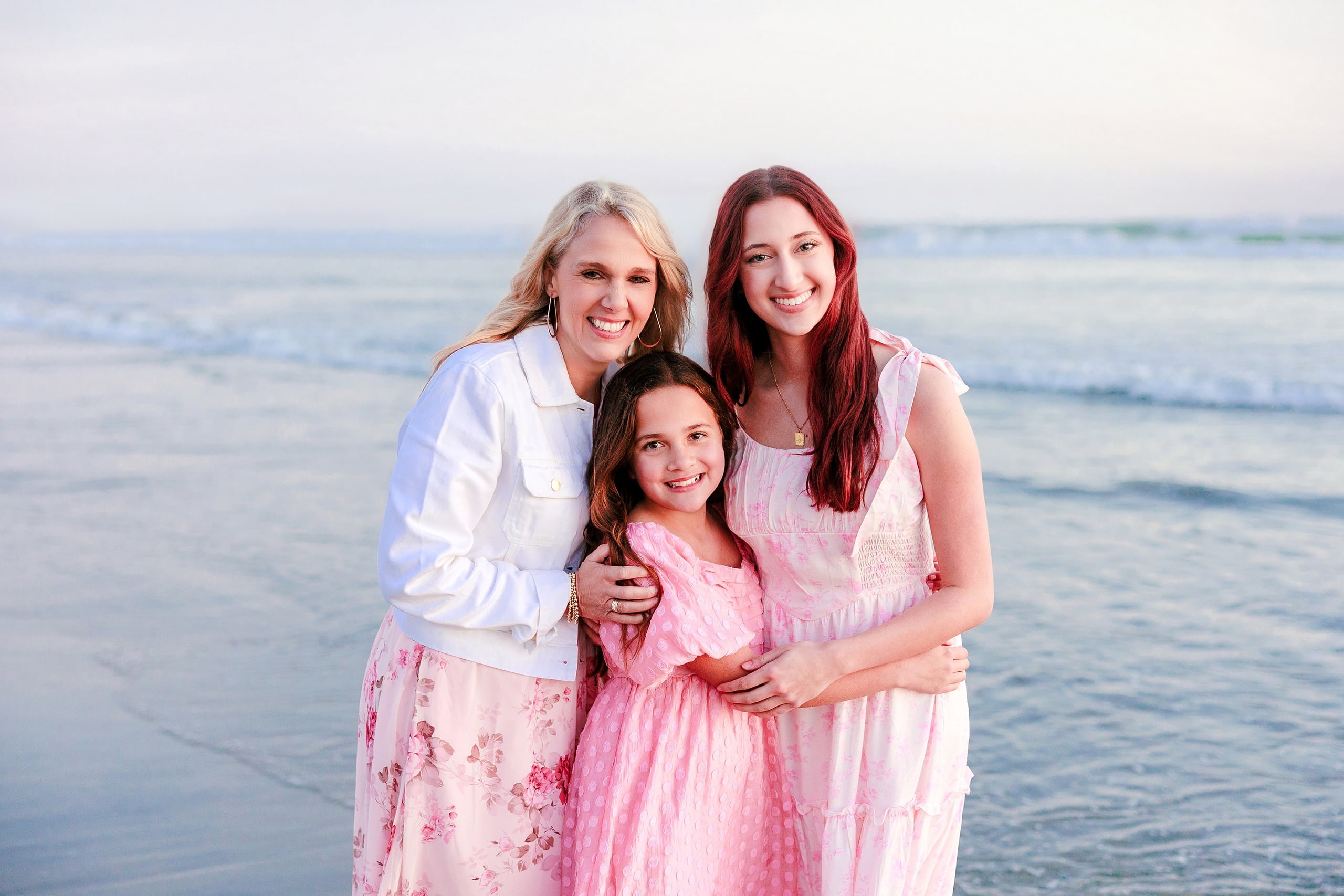 Coronado Beach Memories with the Sanchez Family — 25 Three women together at Coronado Beach with tropical courtyard in background
