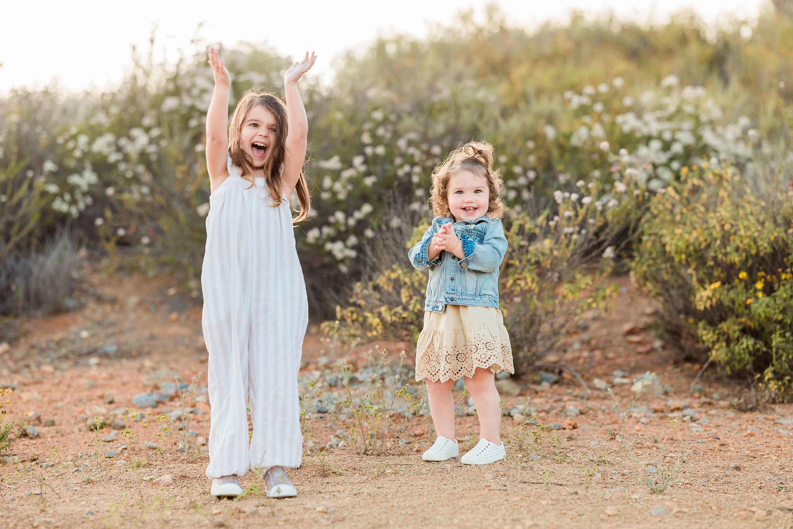 Dictionary Hill Nature Trails Family Photography in San Diego — 11 Two children with older child's arms raised on Dictionary Hill trail