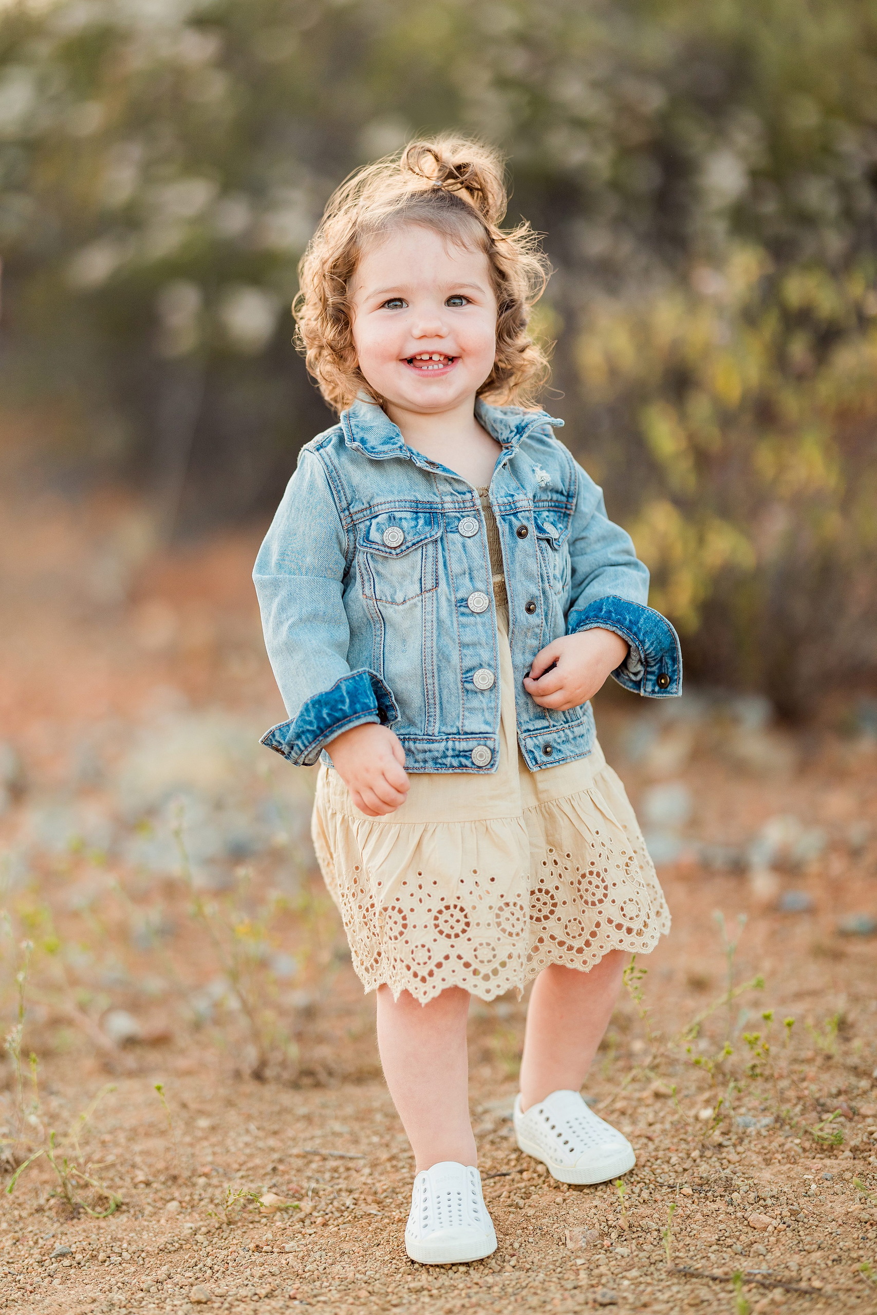 Dictionary Hill Nature Trails Family Photography in San Diego — 12 Young toddler in denim jacket standing on sandy ground at Dictionary Hill
