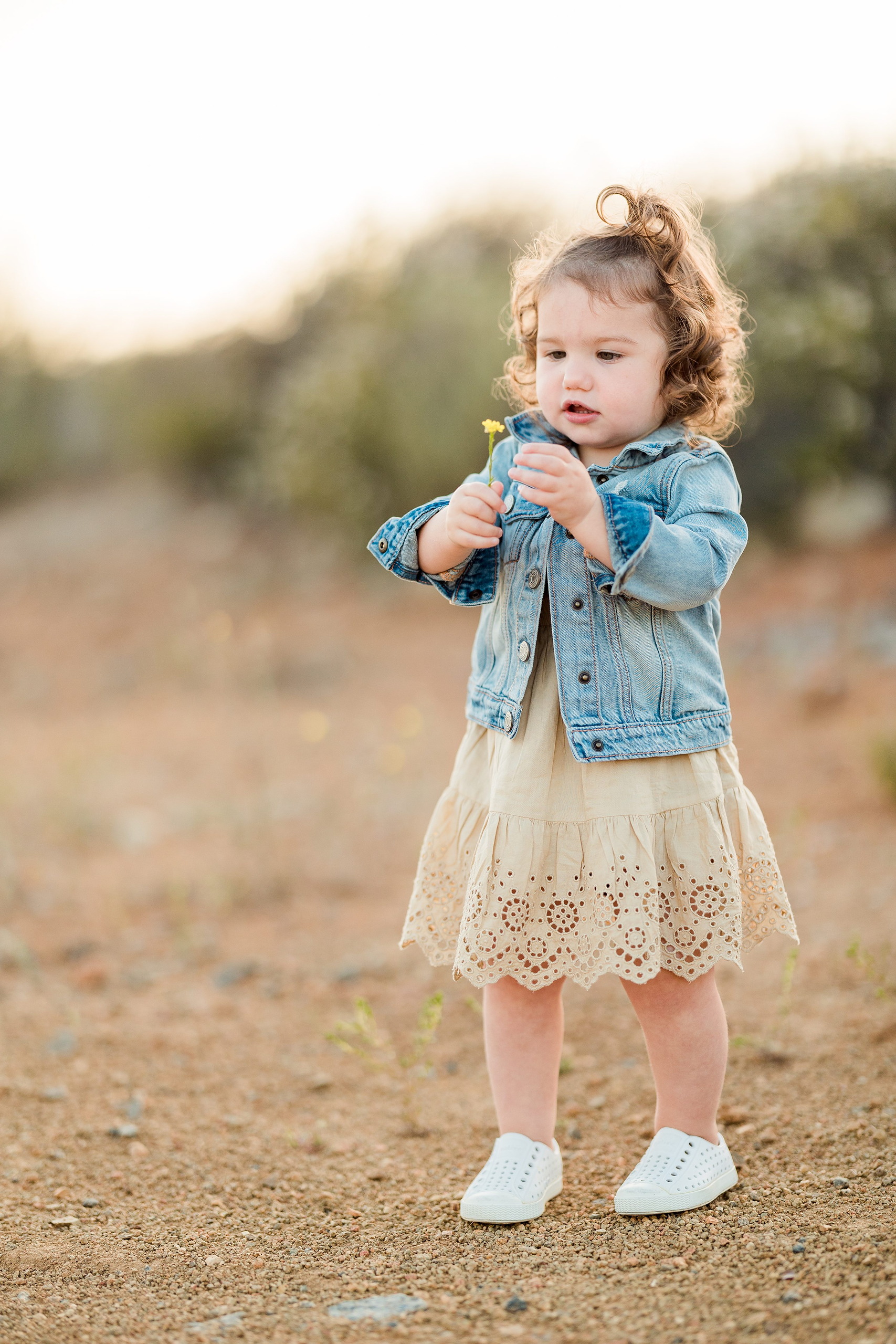 Dictionary Hill Nature Trails Family Photography in San Diego — 13 Toddler in denim jacket looking away while standing on trail