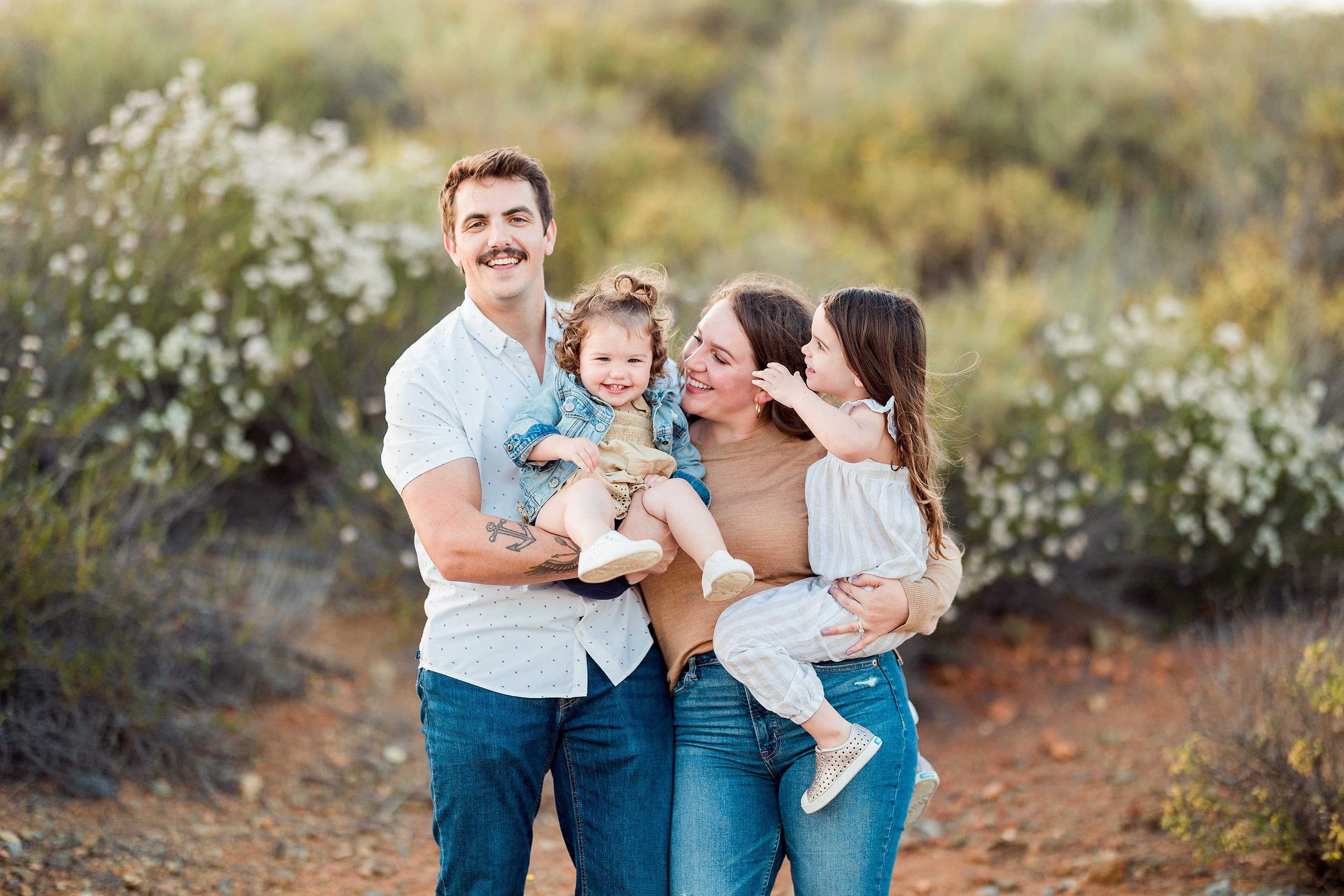 Dictionary Hill Nature Trails Family Photography in San Diego — 21 Family of four standing together holding hands on Dictionary Hill