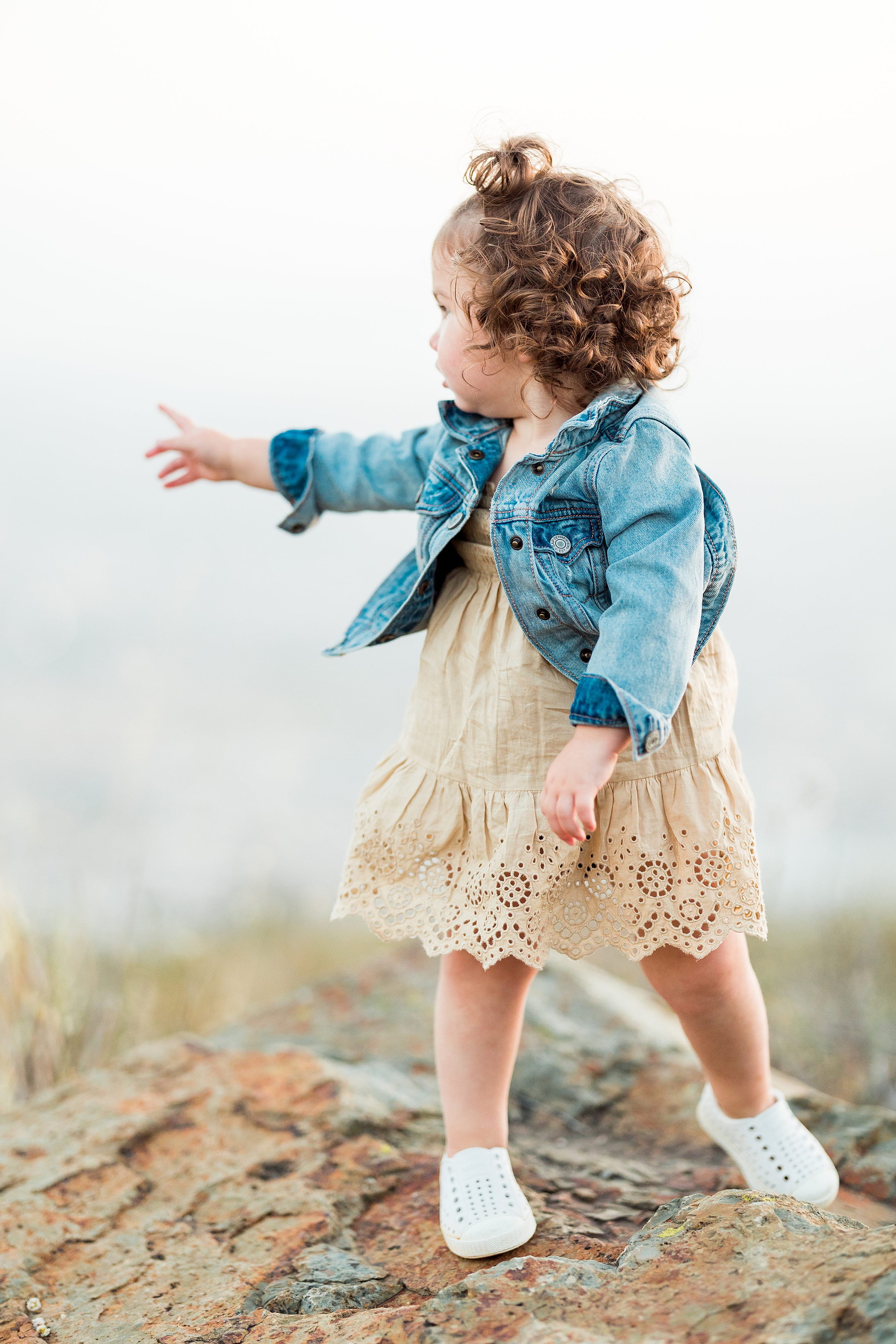Dictionary Hill Nature Trails Family Photography in San Diego — 31 Child walking with arm extended on Dictionary Hill Nature Trails