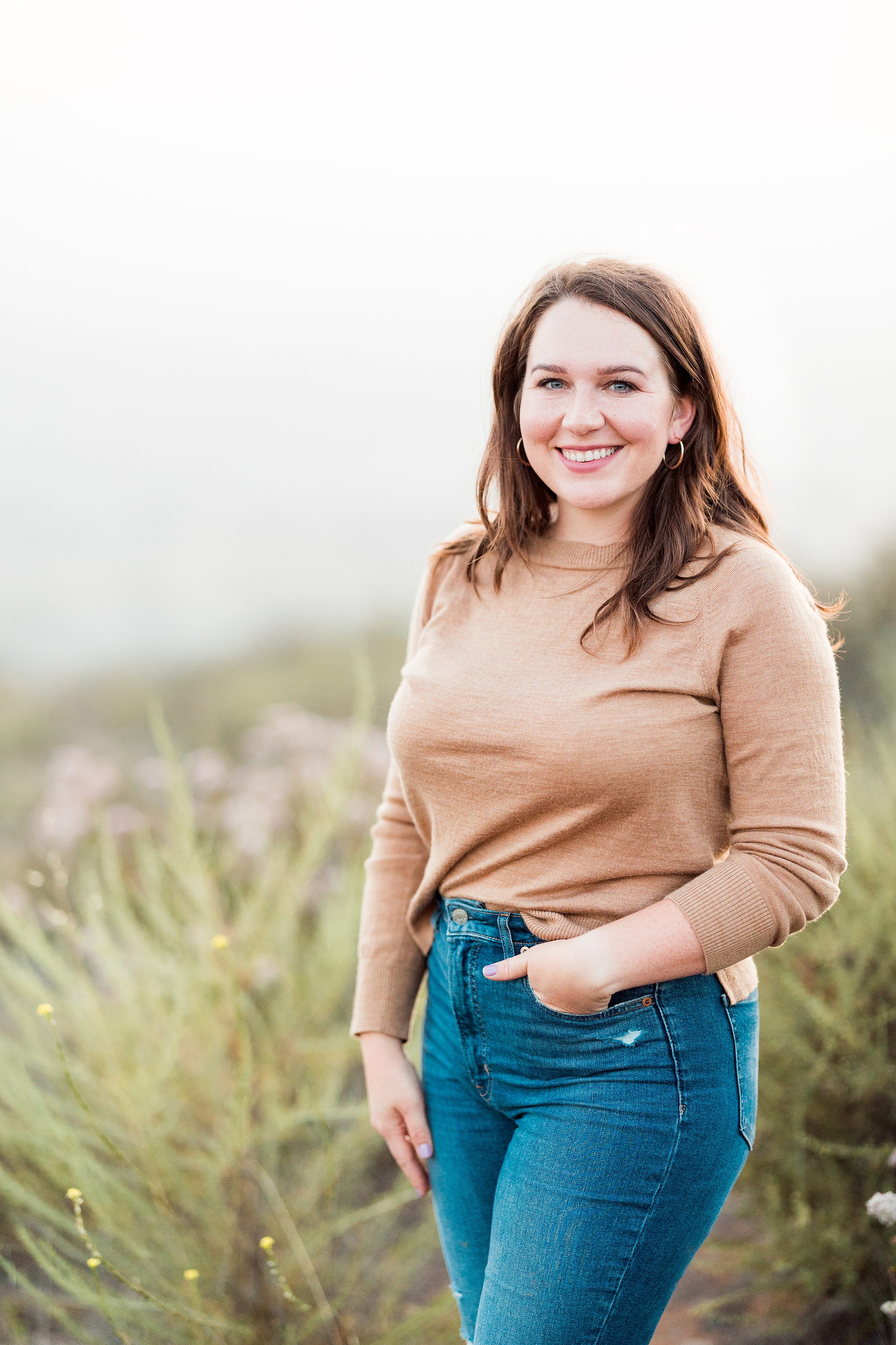 Dictionary Hill Nature Trails Family Photography in San Diego — 36 Woman in tan sweater and jeans standing at Dictionary Hill trails