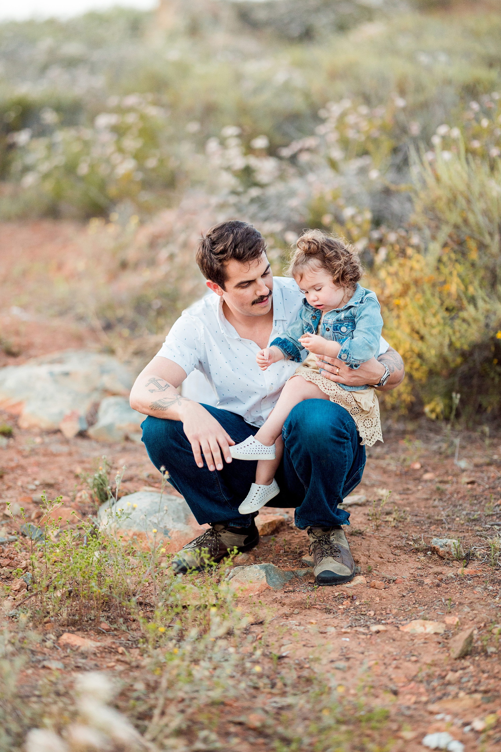 Dictionary Hill Nature Trails Family Photography in San Diego — 38 Father crouching beside toddler on a Dictionary Hill trail