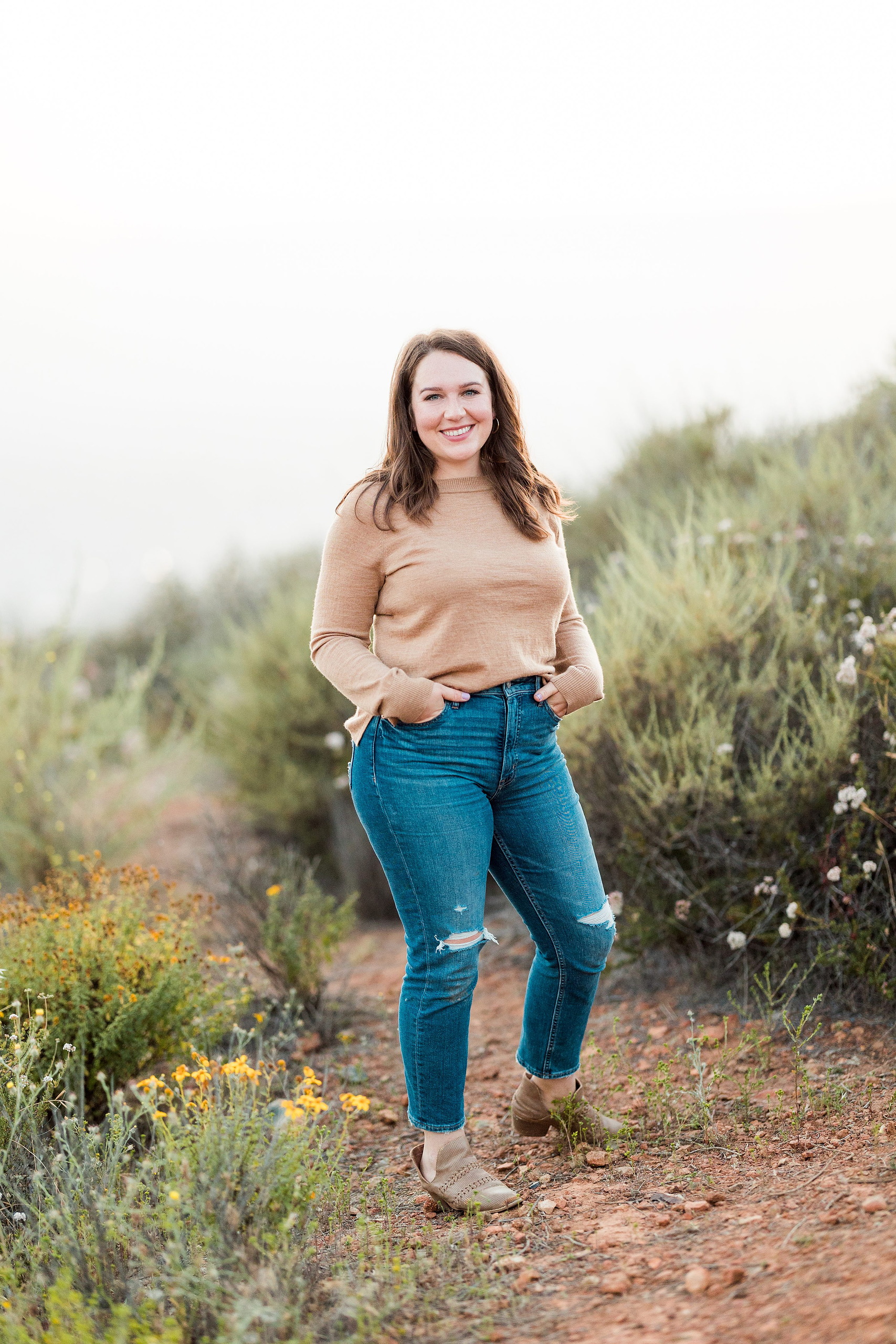 Dictionary Hill Nature Trails Family Photography in San Diego — 39 Woman standing among flowering shrubs at Dictionary Hill