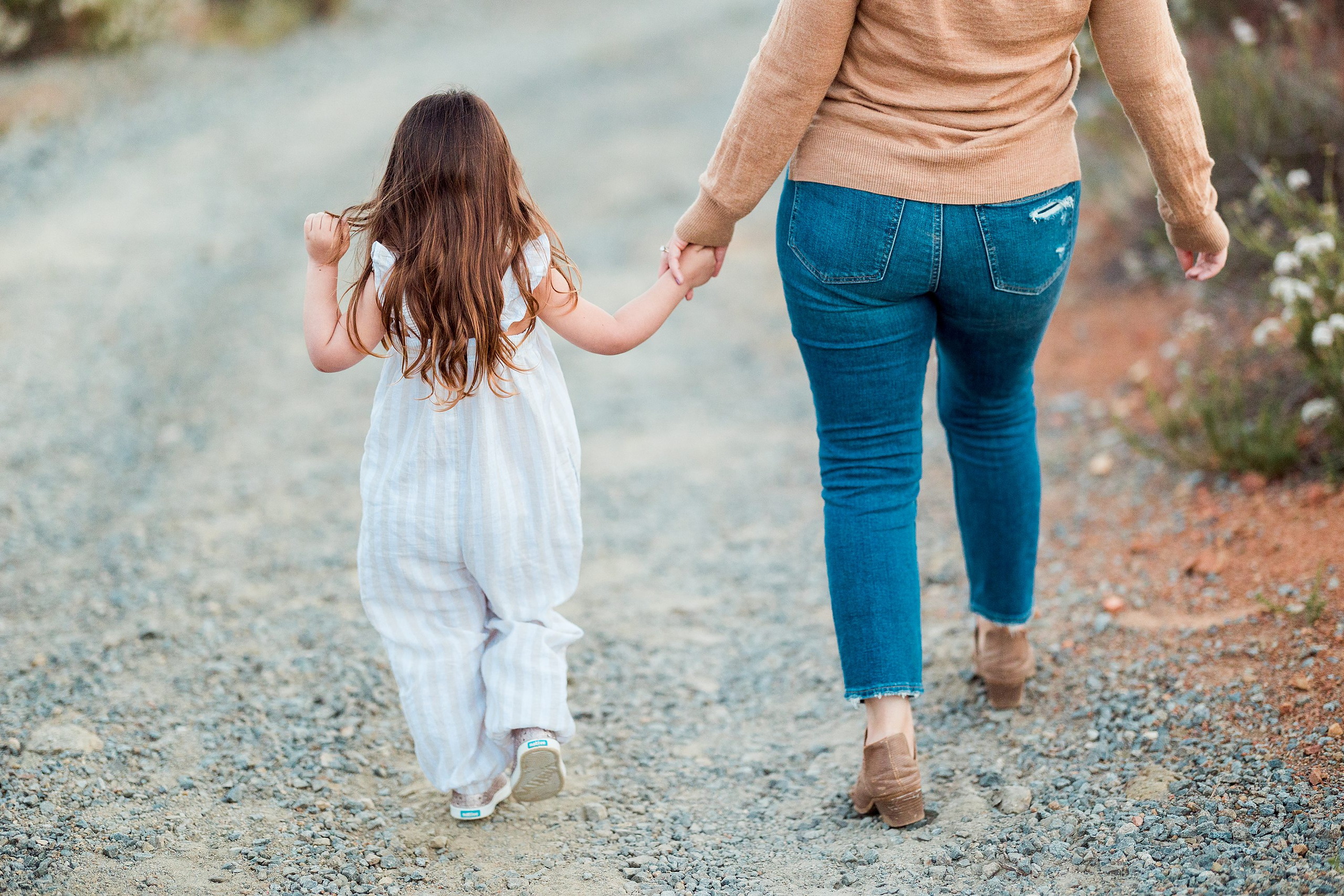 Dictionary Hill Nature Trails Family Photography in San Diego — 40 Woman and child walking hand-in-hand on Dictionary Hill trail