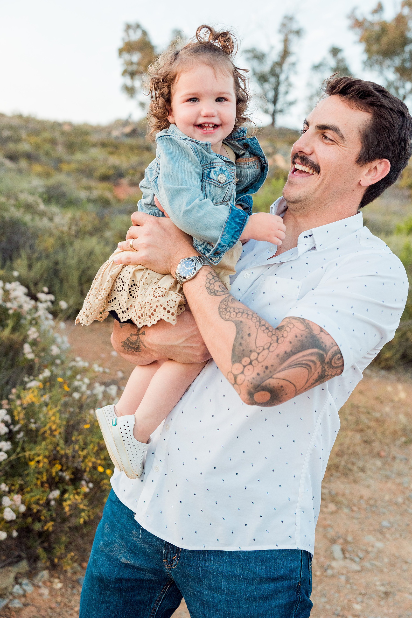 Dictionary Hill Nature Trails Family Photography in San Diego — 49 Father holding toddler while posing on Dictionary Hill trail