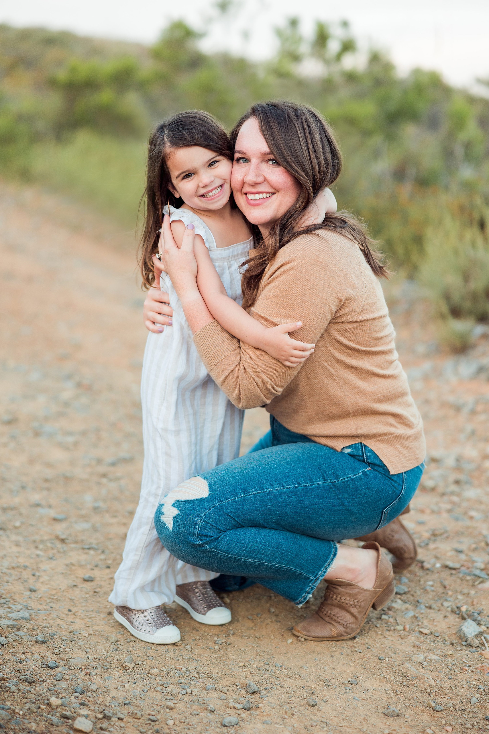 Dictionary Hill Nature Trails Family Photography in San Diego — 50 Woman and child embracing on a Dictionary Hill Nature Trails path