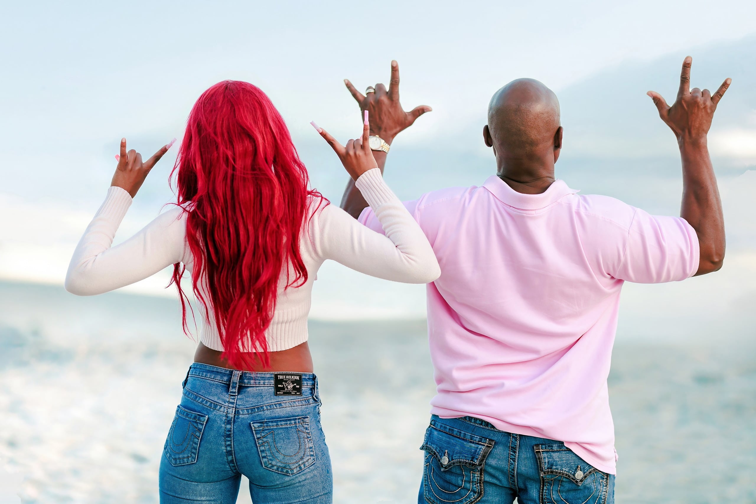 Evanna, Atalia, and Erleen’s Senior Session on Coronado — 13 Senior with pink hair and man making peace signs at Coronado beach