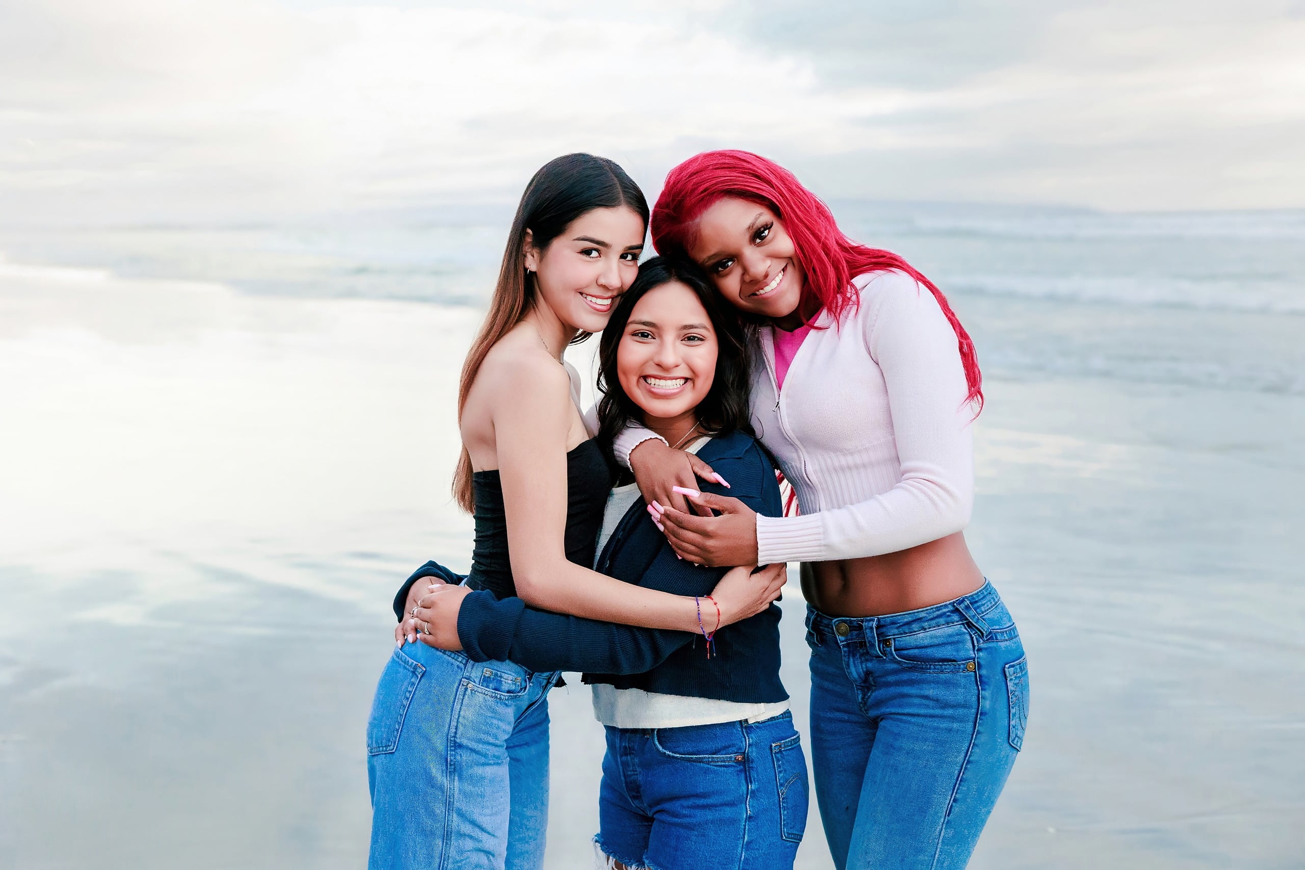 Evanna, Atalia, and Erleen’s Senior Session on Coronado — 32 Evanna, Atalia, and Erleen embracing together on beach at Coronado