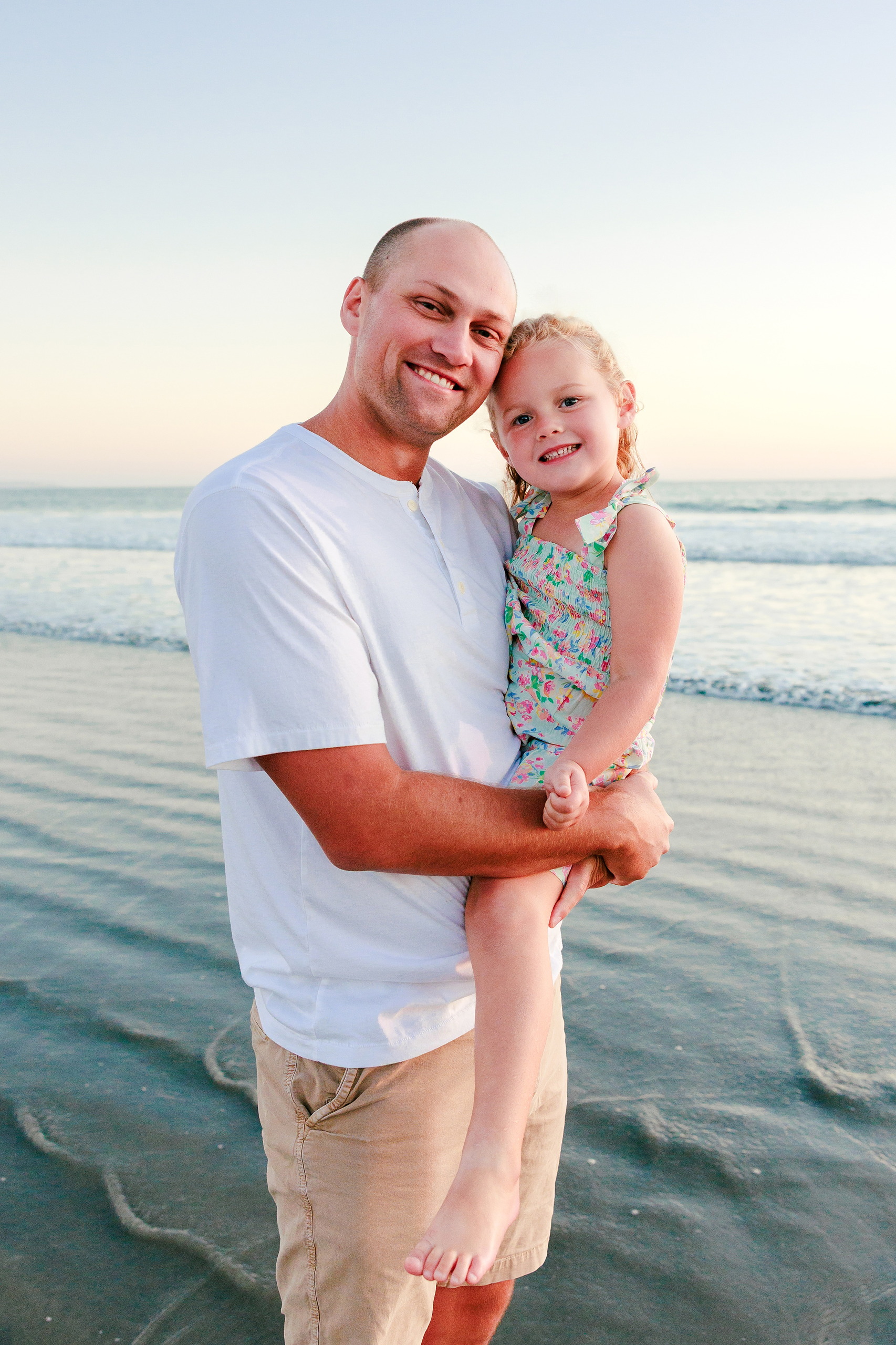 Hotel del Coronado Family Photos — 21 Father and Mabel smiling together on Coronado beach at golden hour