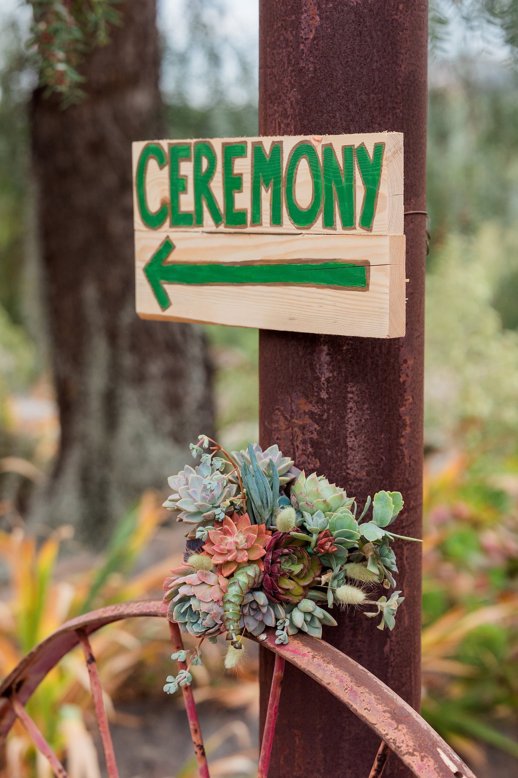 Moriah & Greg’s Wedding — 03 Bride wears botanical succulent crown as a distinctive headpiece in the garden setting