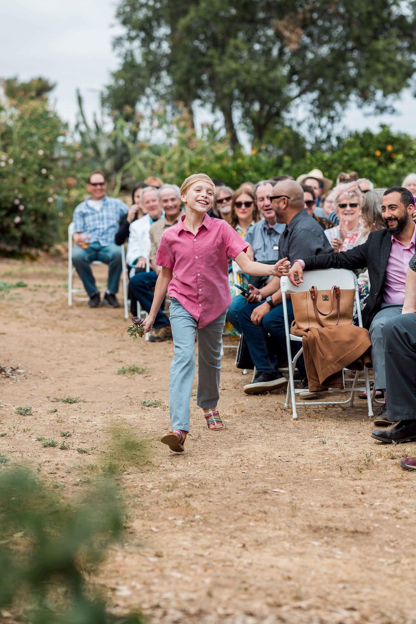 Moriah & Greg’s Wedding — 10 Ken doll ring bearer has arrived via zipline, delivering rings in quirky wedding tradition