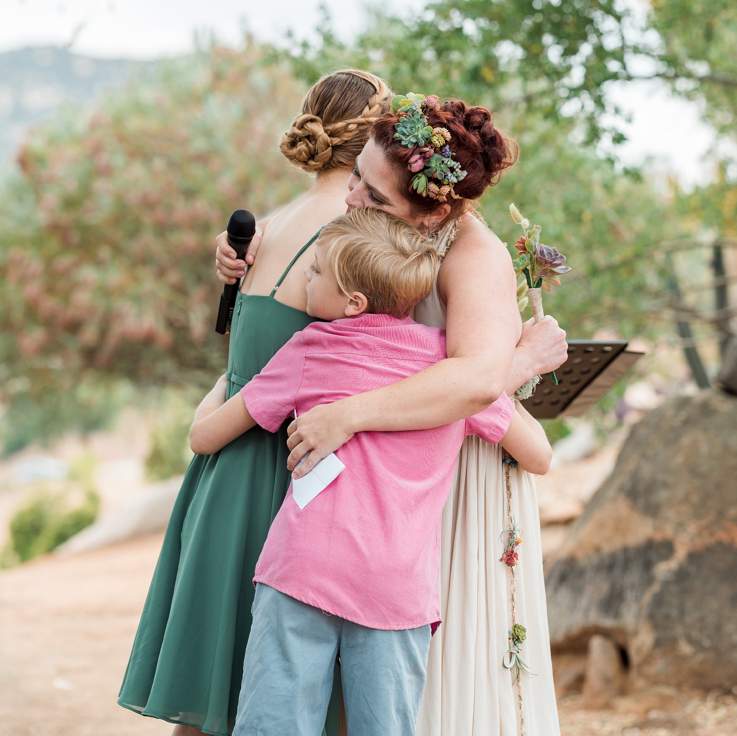 Moriah & Greg’s Wedding — 33 Group of guests laugh together, embodying the loving energy of the gathering