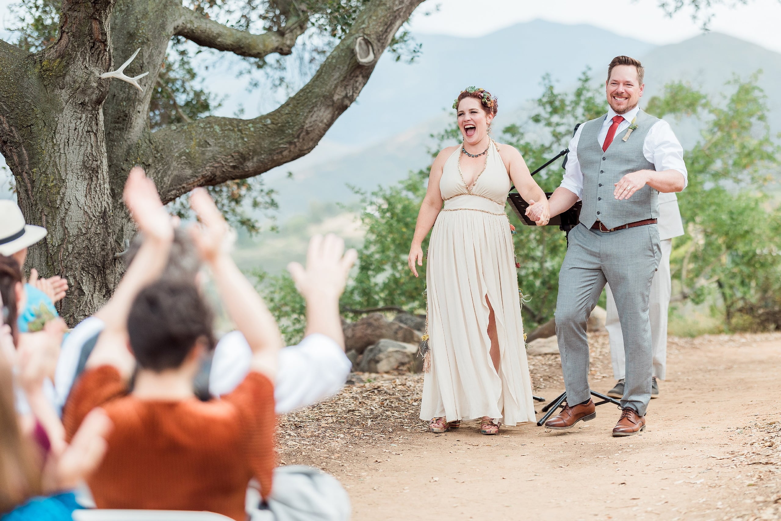 Moriah & Greg’s Wedding — 46 Friends embrace in genuine celebration, reflecting talented loving community gathered