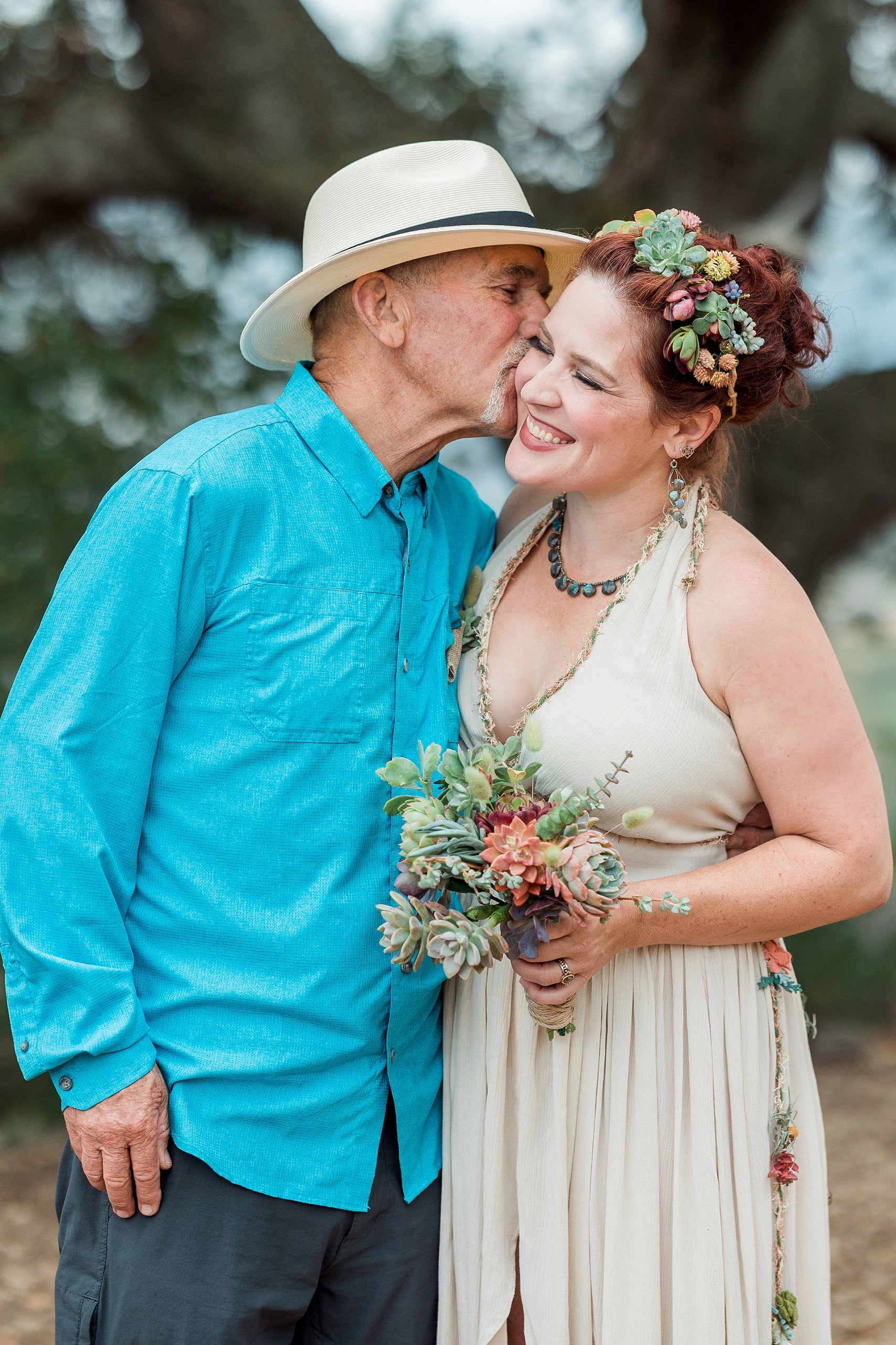 Moriah & Greg’s Wedding — 55 Wide shot shows entire gathering dancing together in quirky joyful garden setting