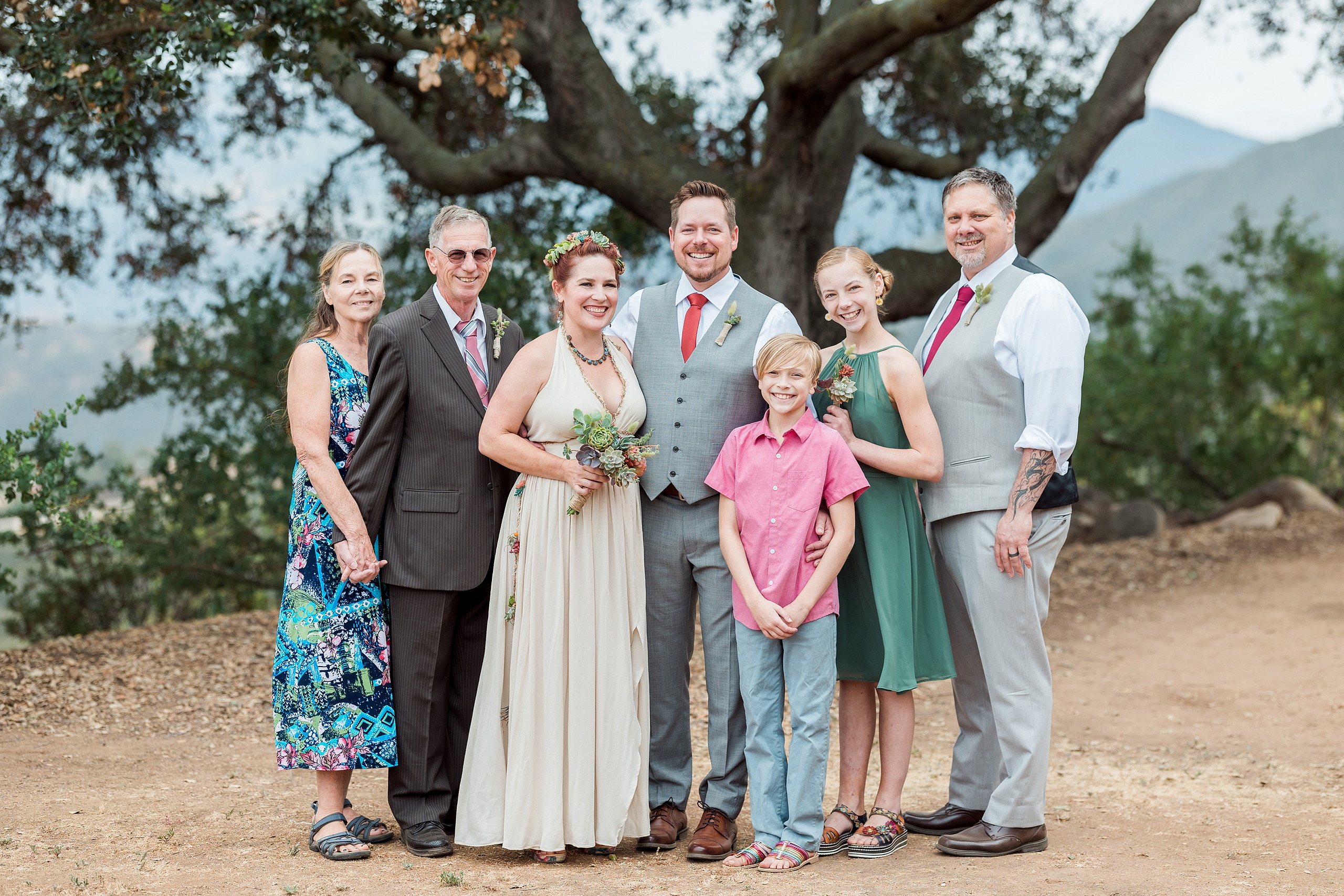 Moriah & Greg’s Wedding — 56 Bride's face radiates happiness celebrating commitment to Greg surrounded by loved ones
