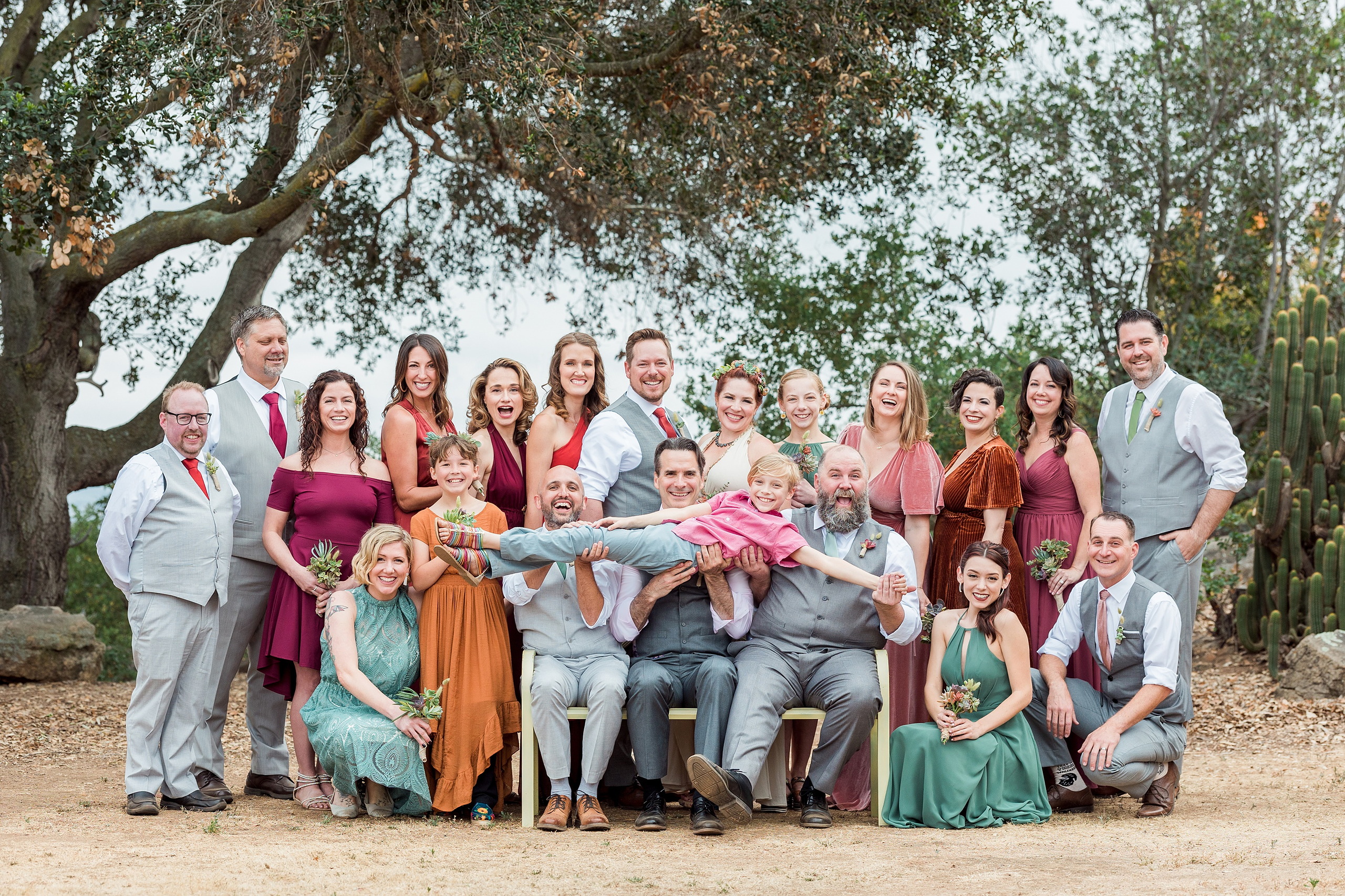 Moriah & Greg’s Wedding — 67 Groom laughs openly with guests, embodying joyful and carefree spirit of the day
