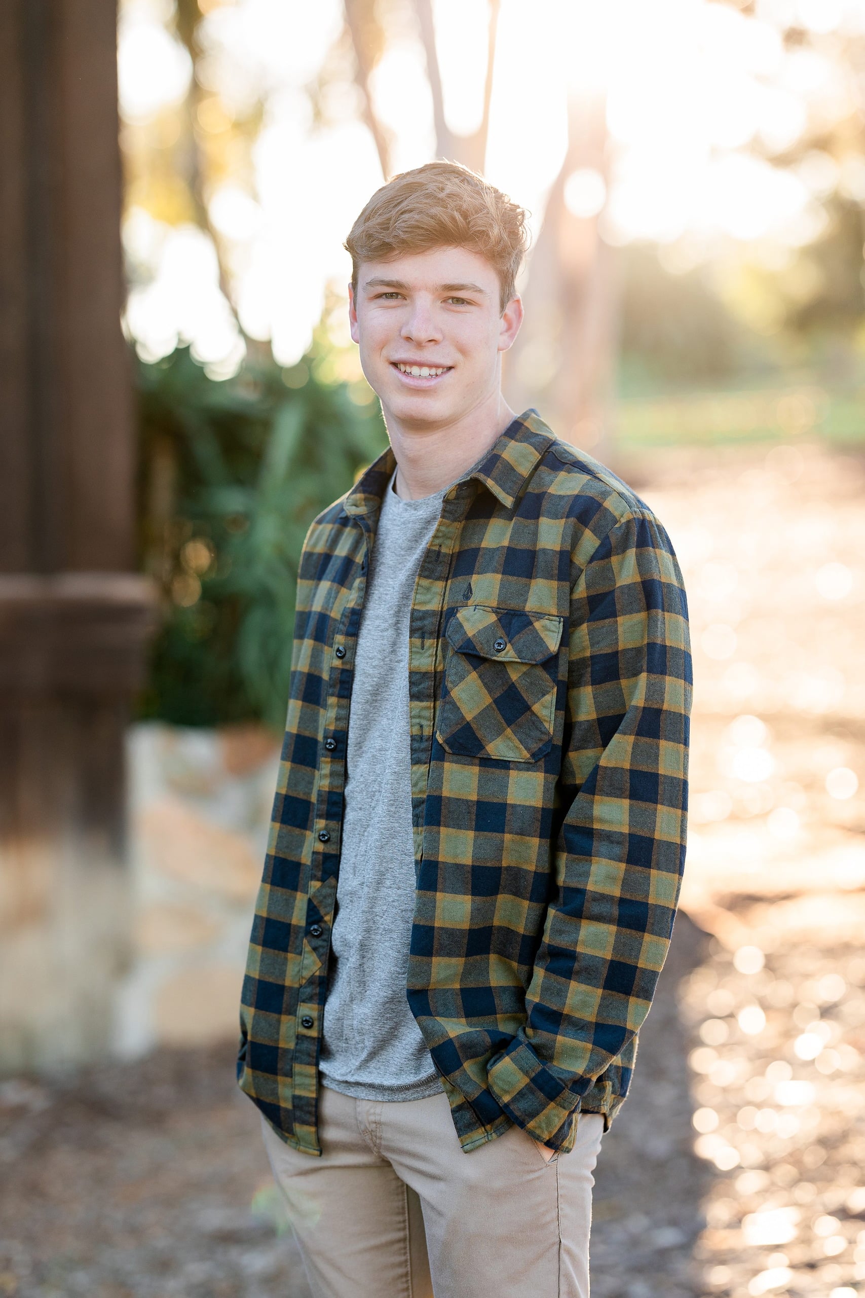 Photographer San Diego — 04 Senior teen boy portrait in checkered shirt at outdoor location