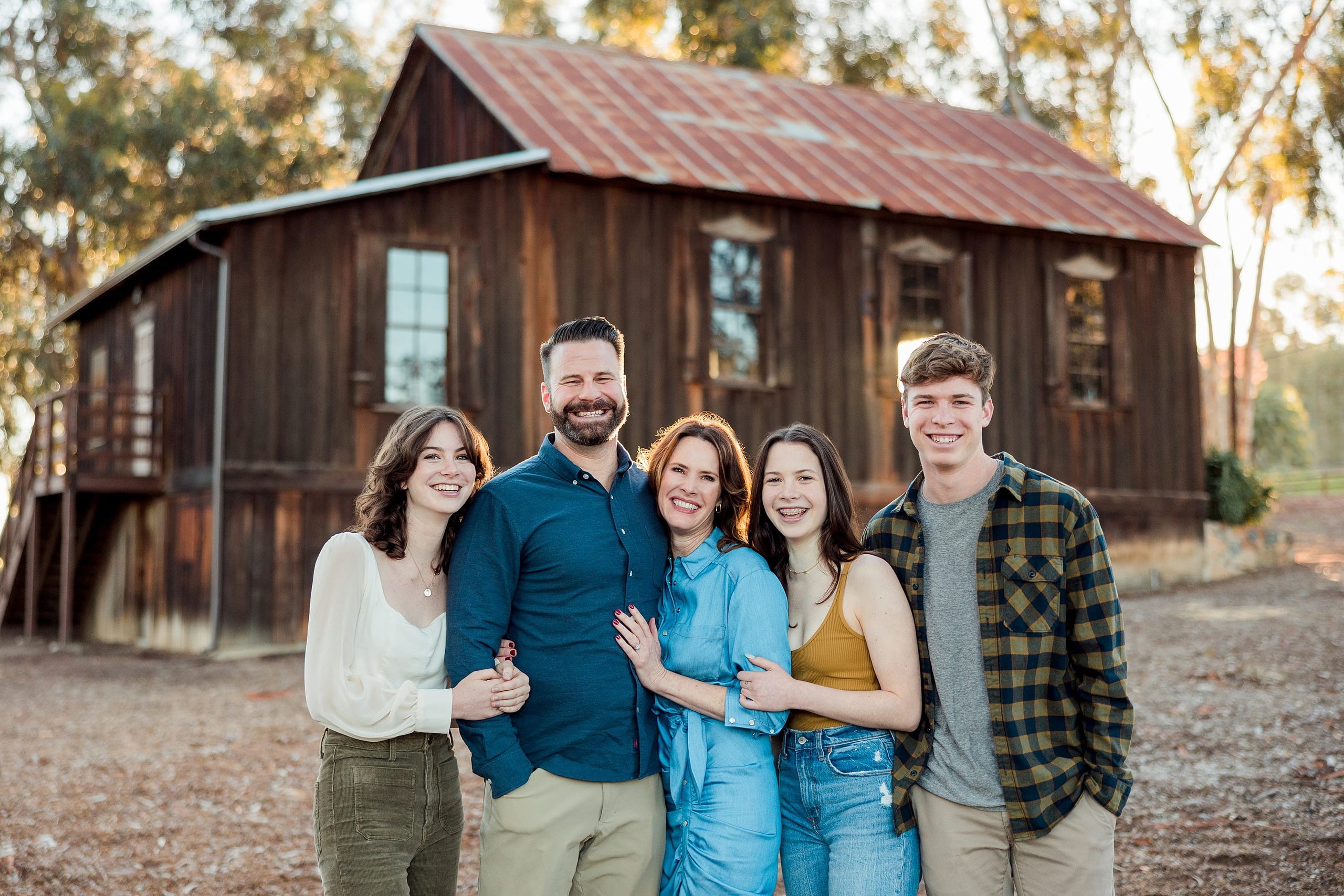 Photographer San Diego — 27 Family of five standing in front of historic Town Hall building