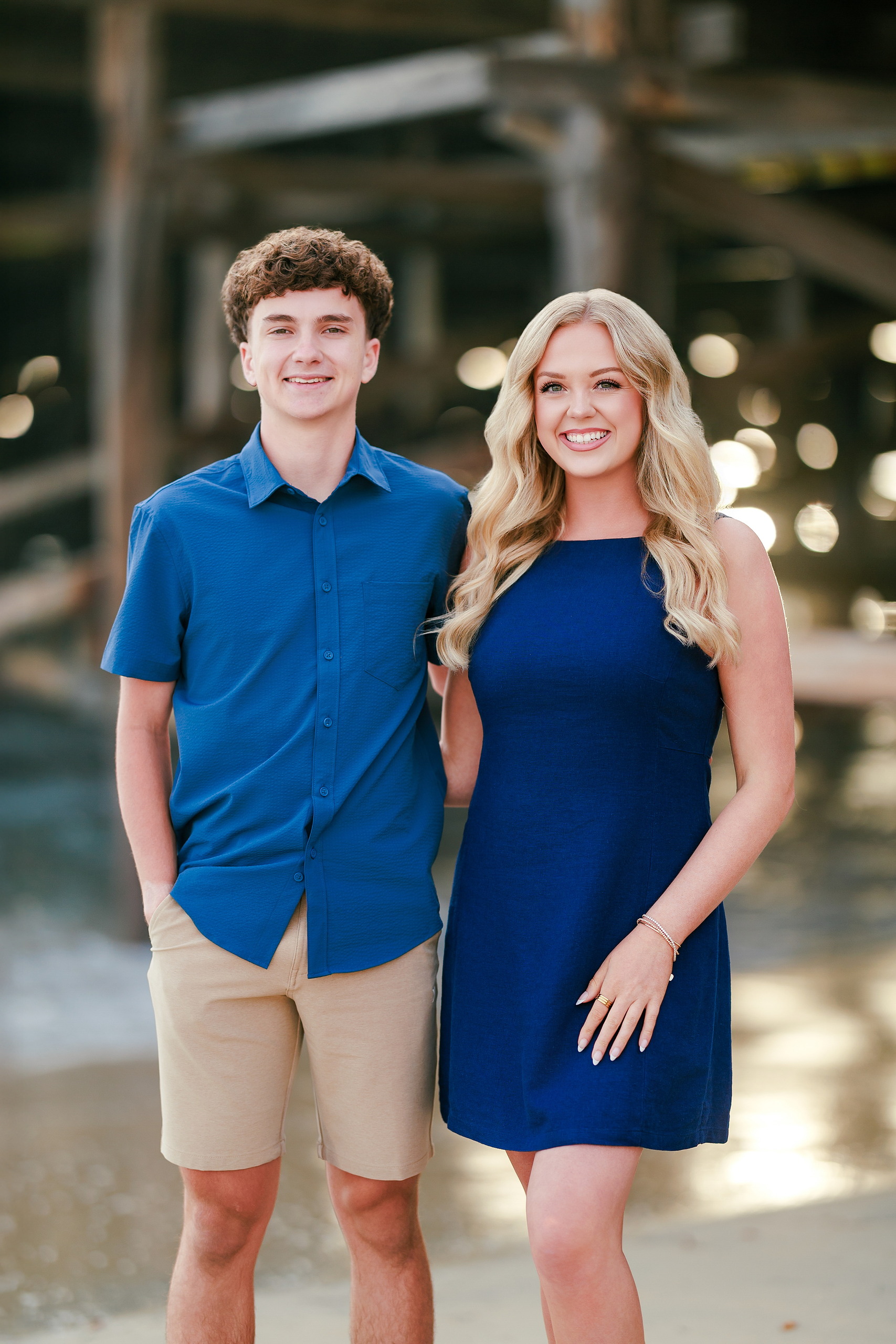 San Diego Beach Family Photos — 06 Young woman in blue dress standing with teen boy on beach