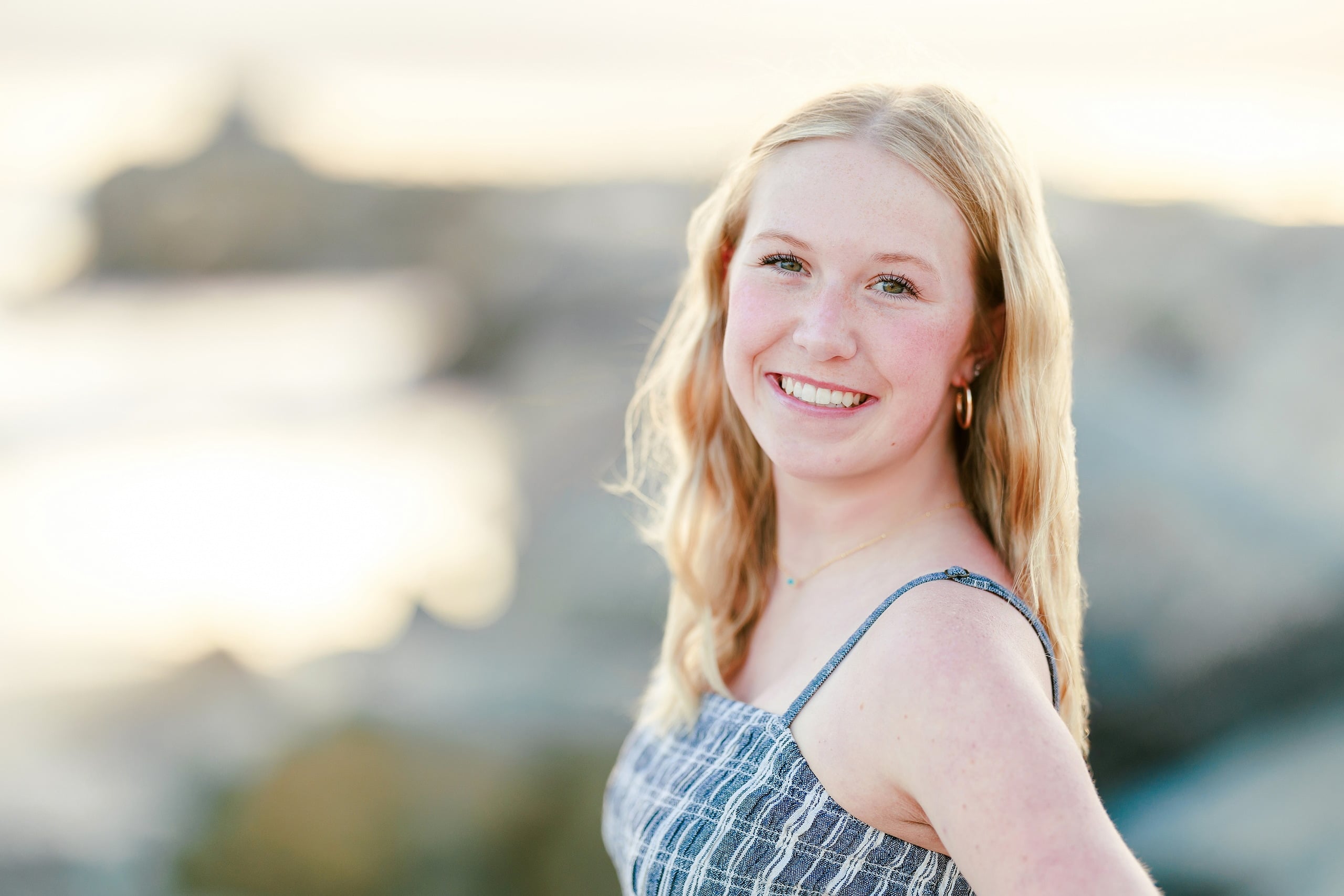 Sisters & Senior Portraits at the Del — 15 Teen running on wet sand in turquoise top at golden hour light