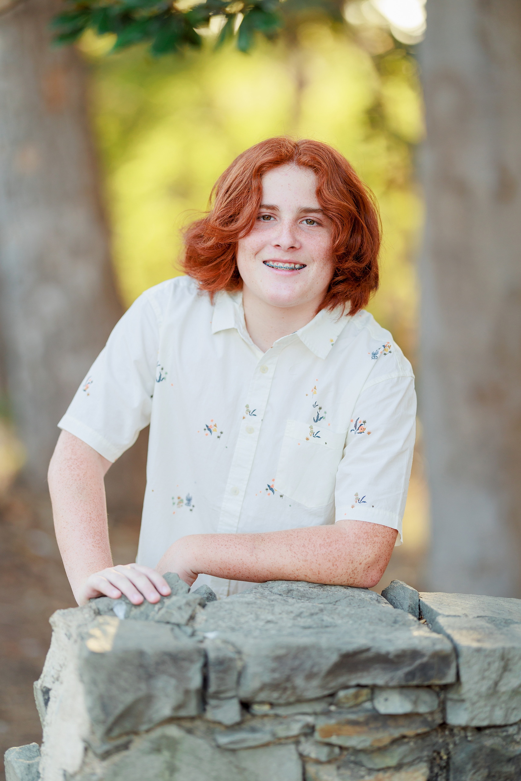 Six Years Later: Family Photos in Balboa Park — 17 Teenager smiling in lush garden backdrop, Balboa Park