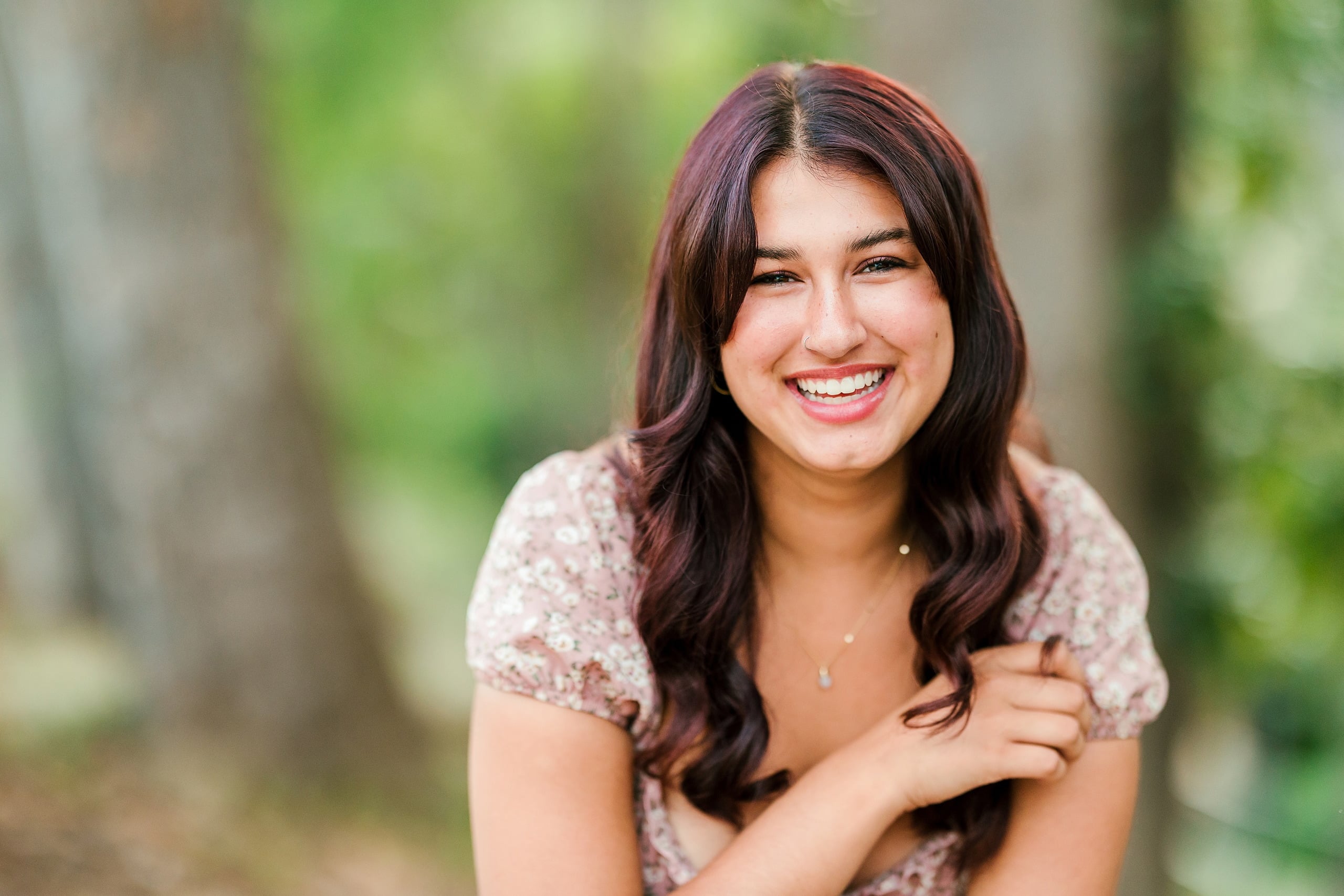 Sonia’s Senior Portraits in Balboa Park — 01 A teenage woman standing confidently for her senior portraits at Balboa Park