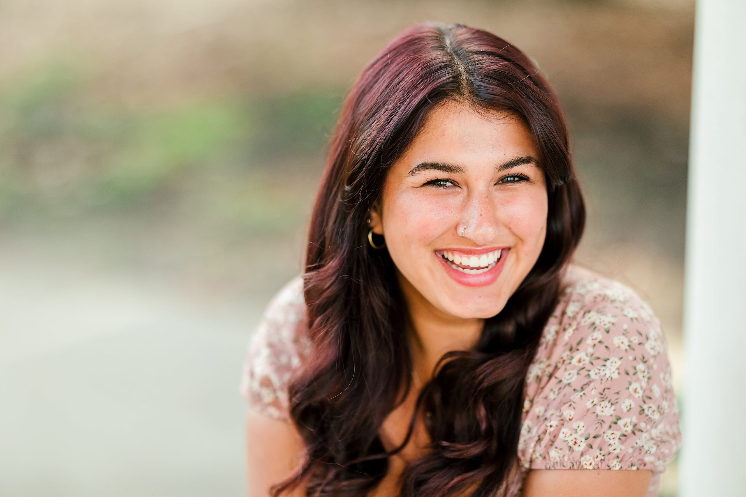 Sonia’s Senior Portraits in Balboa Park — 05 A senior positioned among the trees at Balboa Park for her portraits