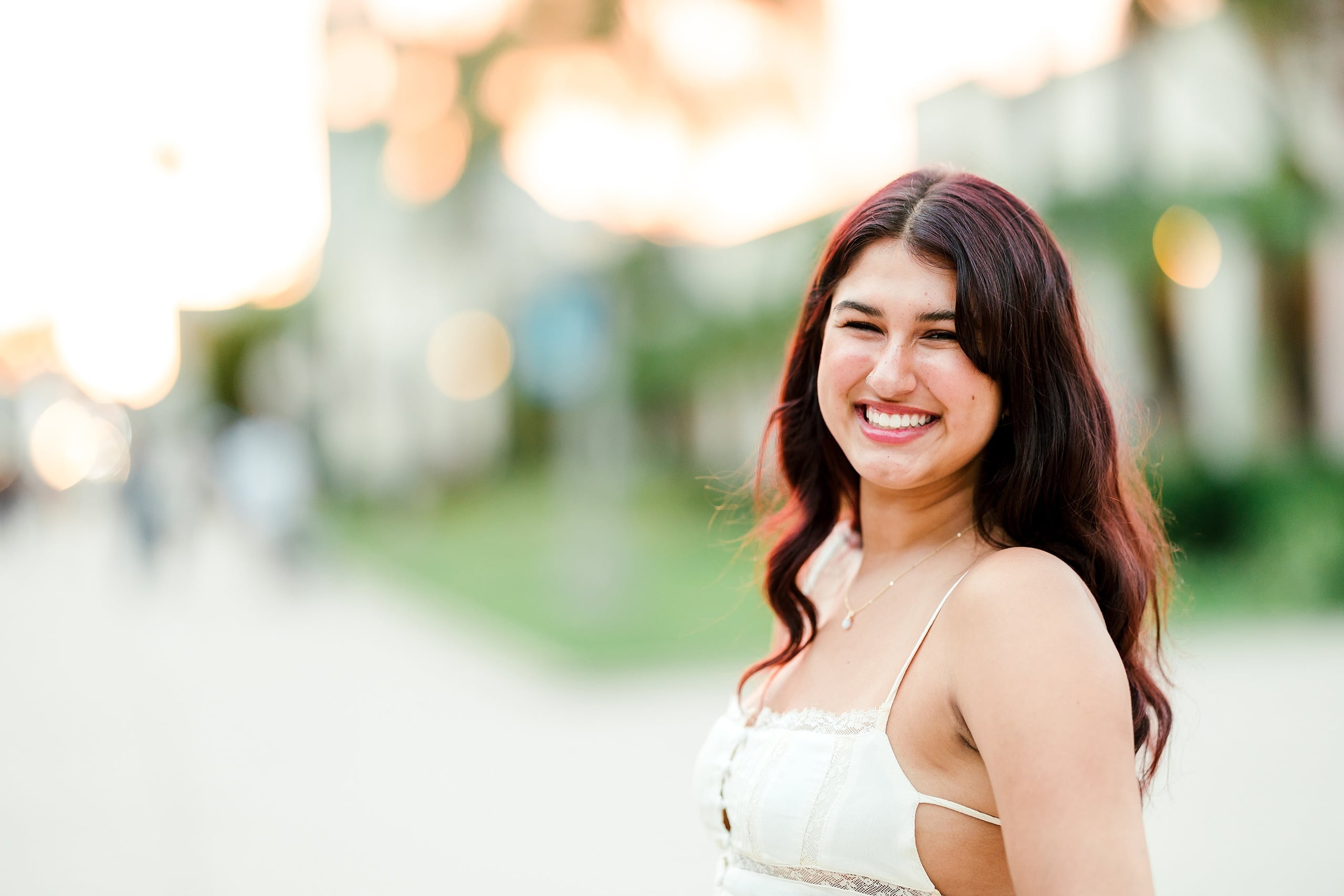 Sonia’s Senior Portraits in Balboa Park — 23 A young woman standing tall at Balboa Park for her senior portraits