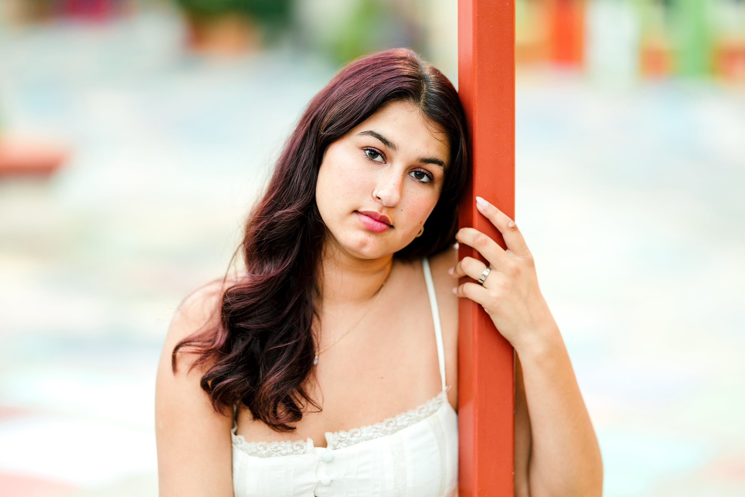 Sonia’s Senior Portraits in Balboa Park — 24 Sonia striding naturally toward the camera for her senior portrait session