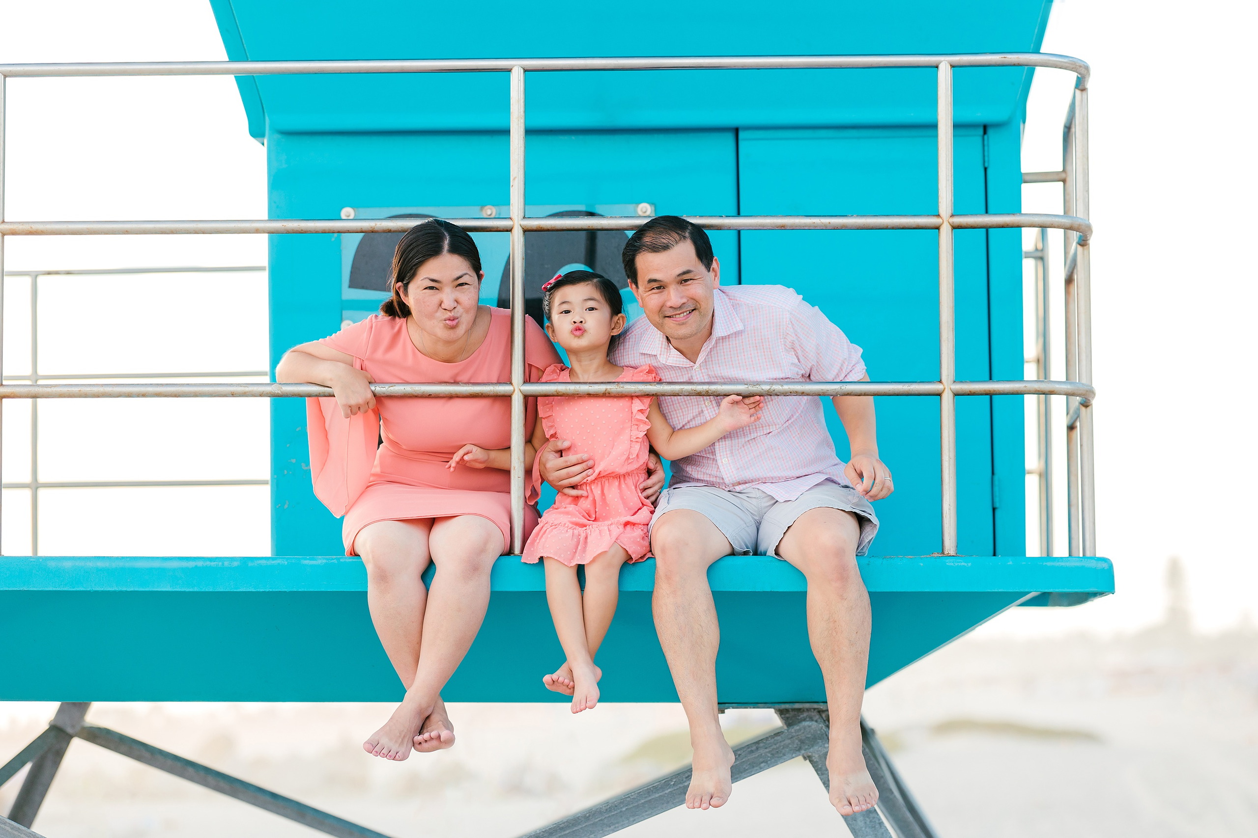 Turning Five on Coronado — 10 Mom, dad, and Ava sitting together on the lifeguard tower at beach