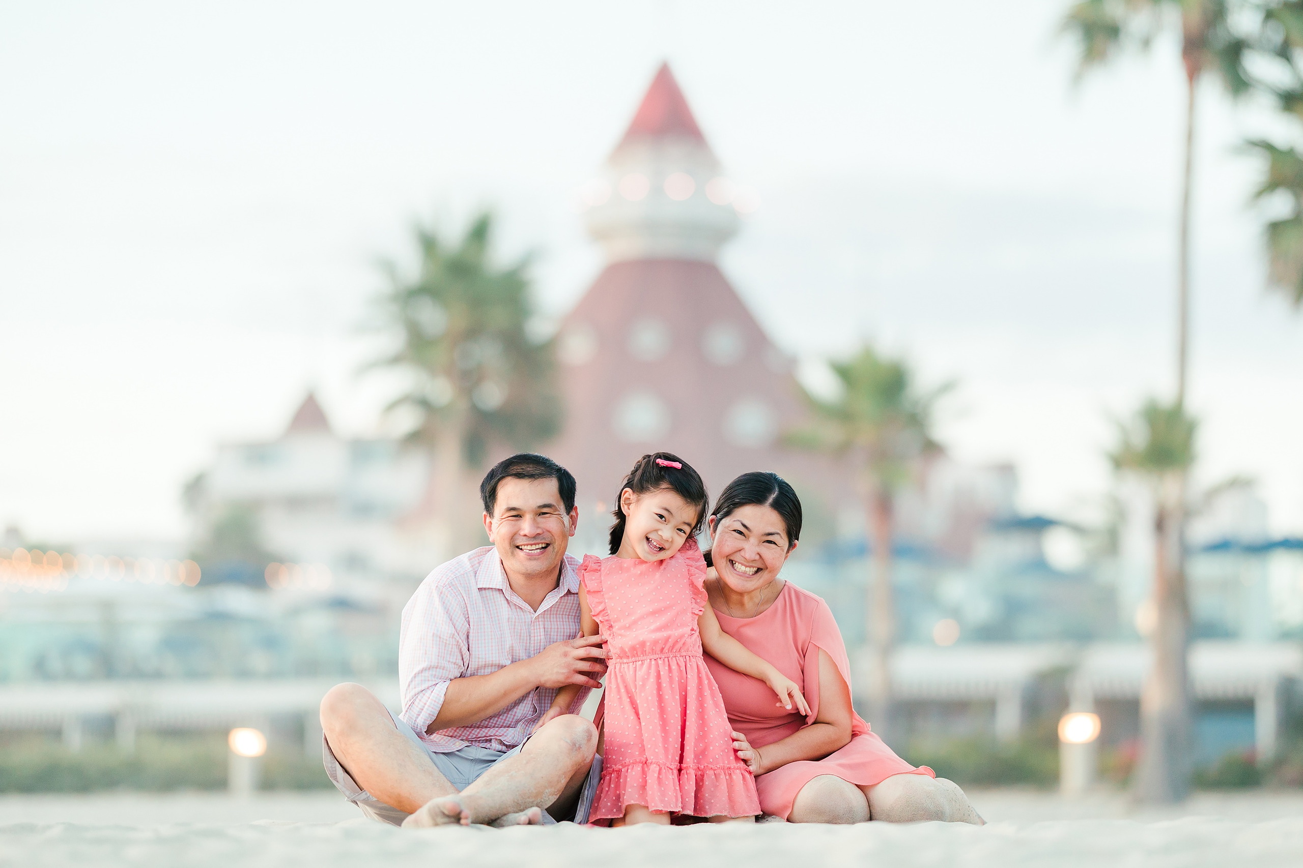 Turning Five on Coronado — 32 Ava and family portrait at Hotel del Coronado with pink tower visible